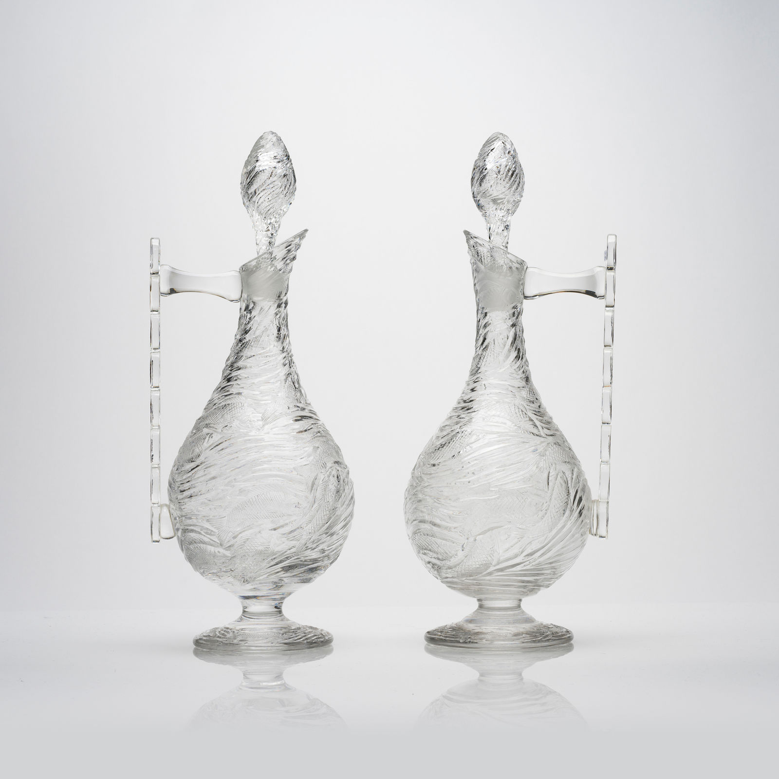 A Pair of Fatimid Style English Glass Ewers, 19th Century
