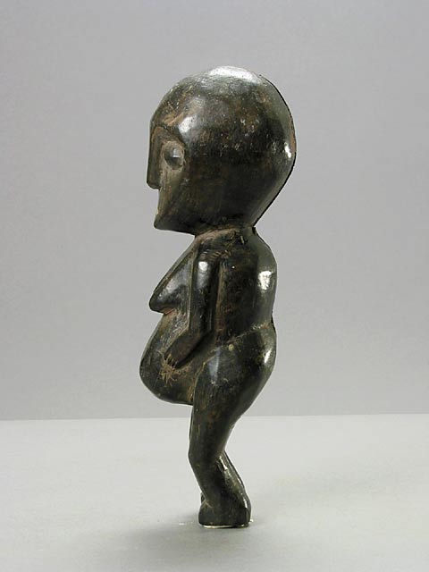 Lega Wooden Sculpture of a Standing Woman, 20th Century CE