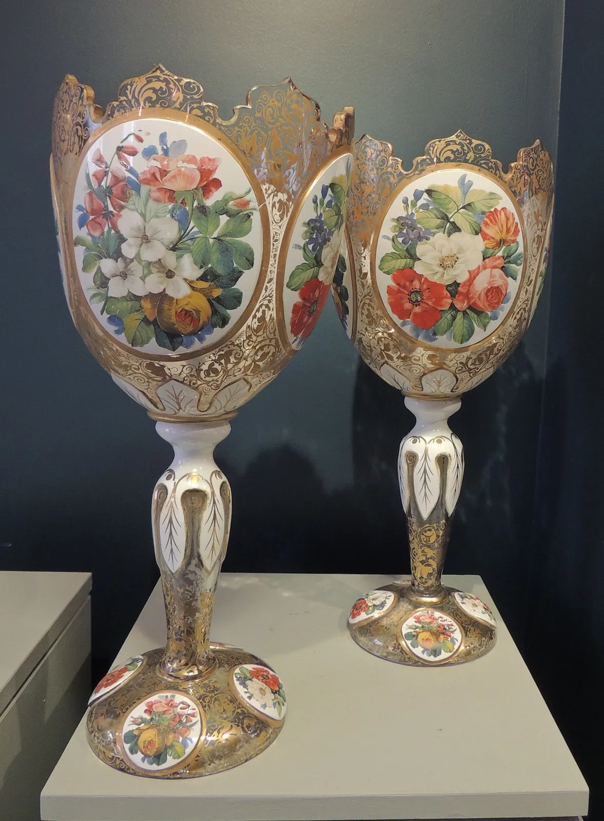 Pair of clear glass vases with floral decoration
