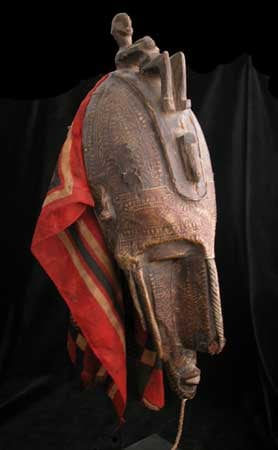 Marka Brass-Plaited Wooden Mask with a Colored Cloth, 20th Century CE