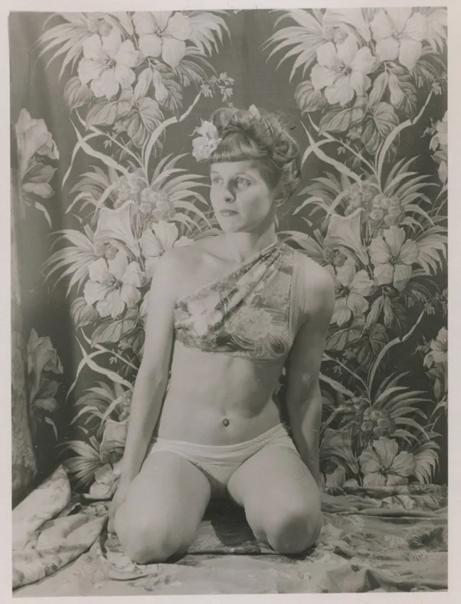 Eugene Von Bruenchenhein, Untitled (Marie with floral halter top, flower in hair, hibiscus background), c. 1940s