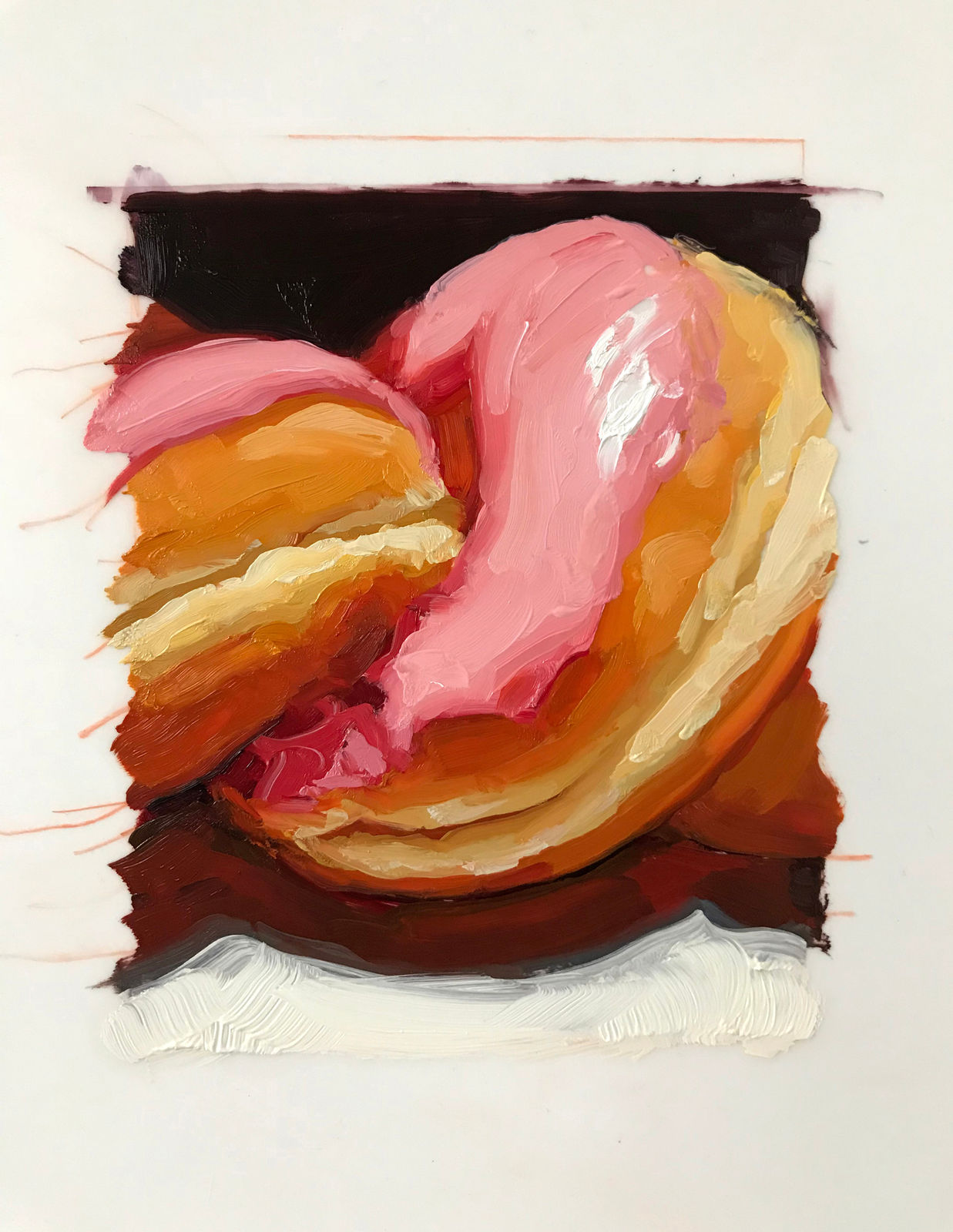 two doughnuts with pink icing