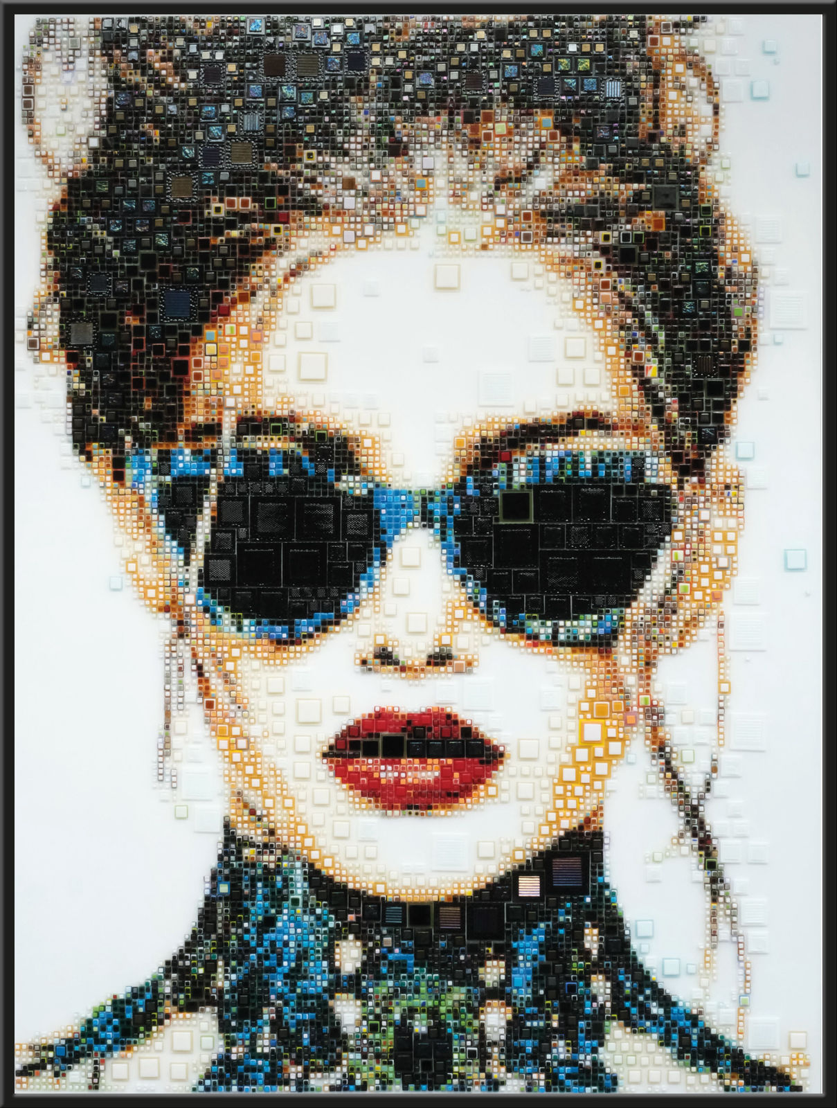 “Ussu”, mixed media work by Isabelle Scheltjens artist from Belgium. Available at Carousel Fine Art Chicago. The artist’s technique involves glass mosaics, creating captivating works from thousands of hand-cut glass shards varying in color, shape, and size. She uses glass to craft beautiful mosaics of female subjects. Developing her own style of portraiture, Isabelle layers colored glass shards through a delicate process that incorporates color theory and glass fusion. Colors of this work : Blue, Green, Red, Beige, Brown, Grey, White, Black