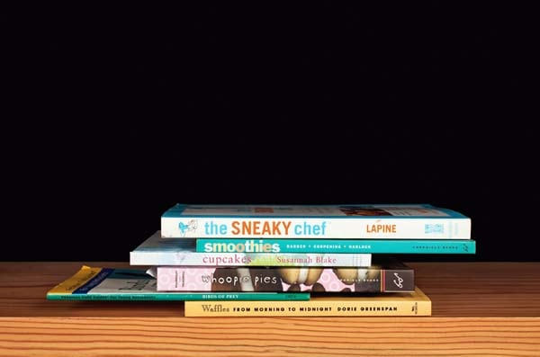 Nina Katchadourian, The Sneaky Chef from the series Family Gathering, 2013 ("Sorted Books" project, 1993-ongoing), 2013