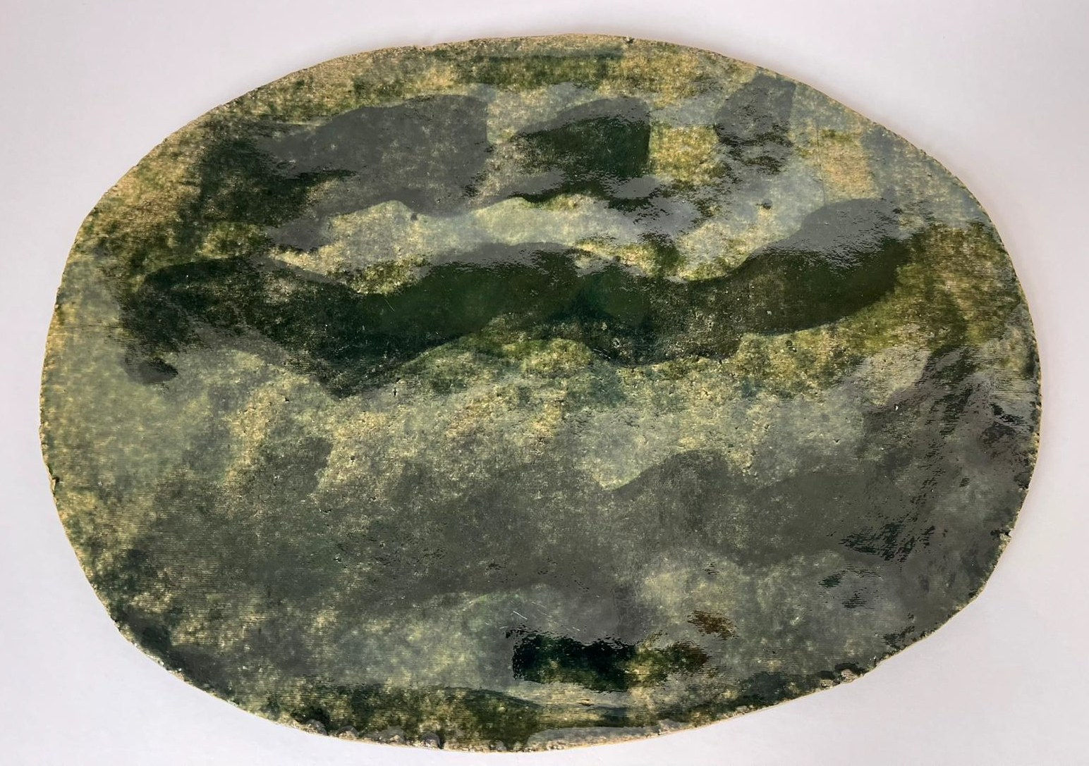 ARD, Oval green plate with wave detail, 2025