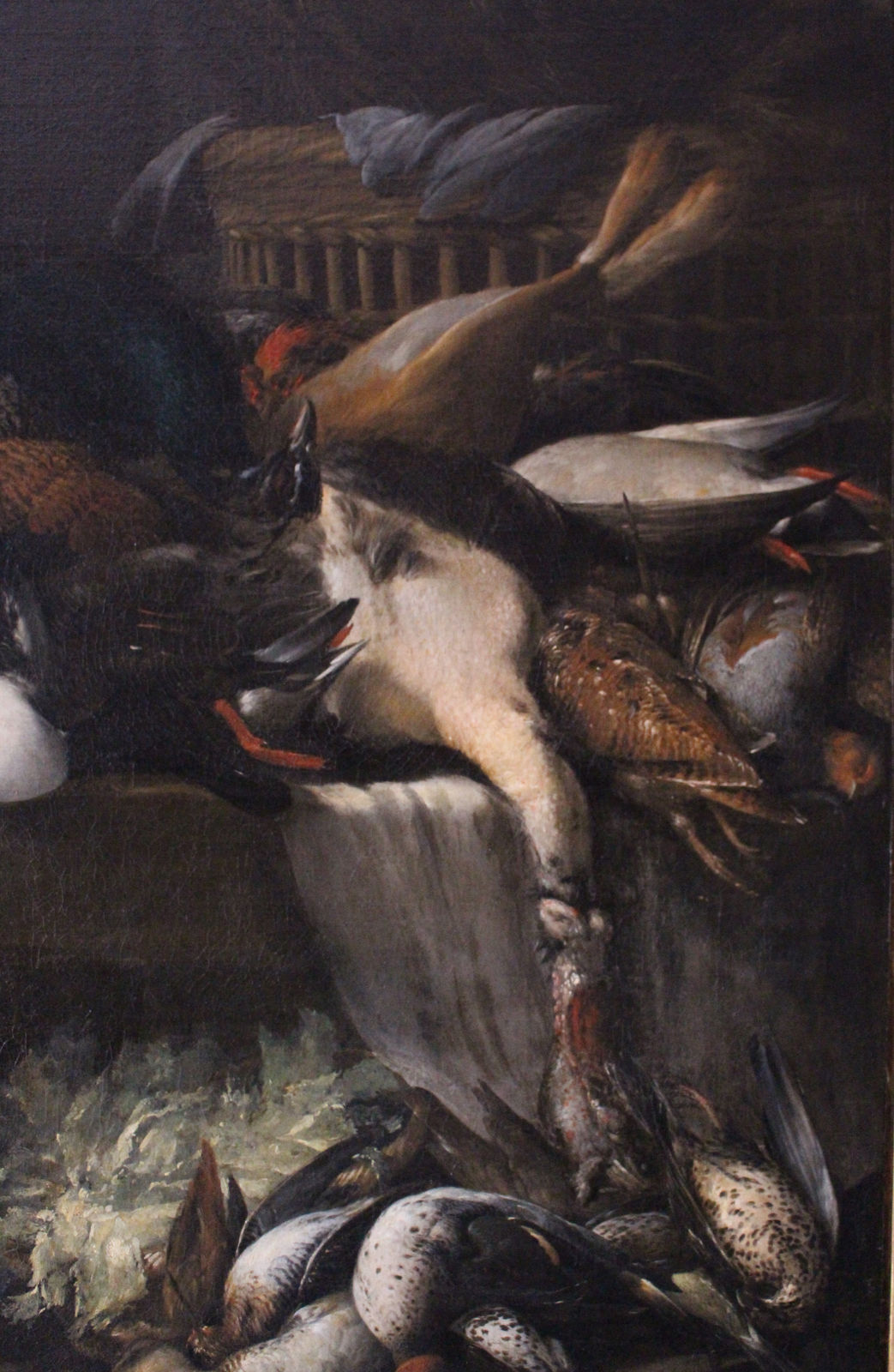 PETER VAN BOUCLE, Still life of game, vegetables, a pig, and a boar’s head in a basket