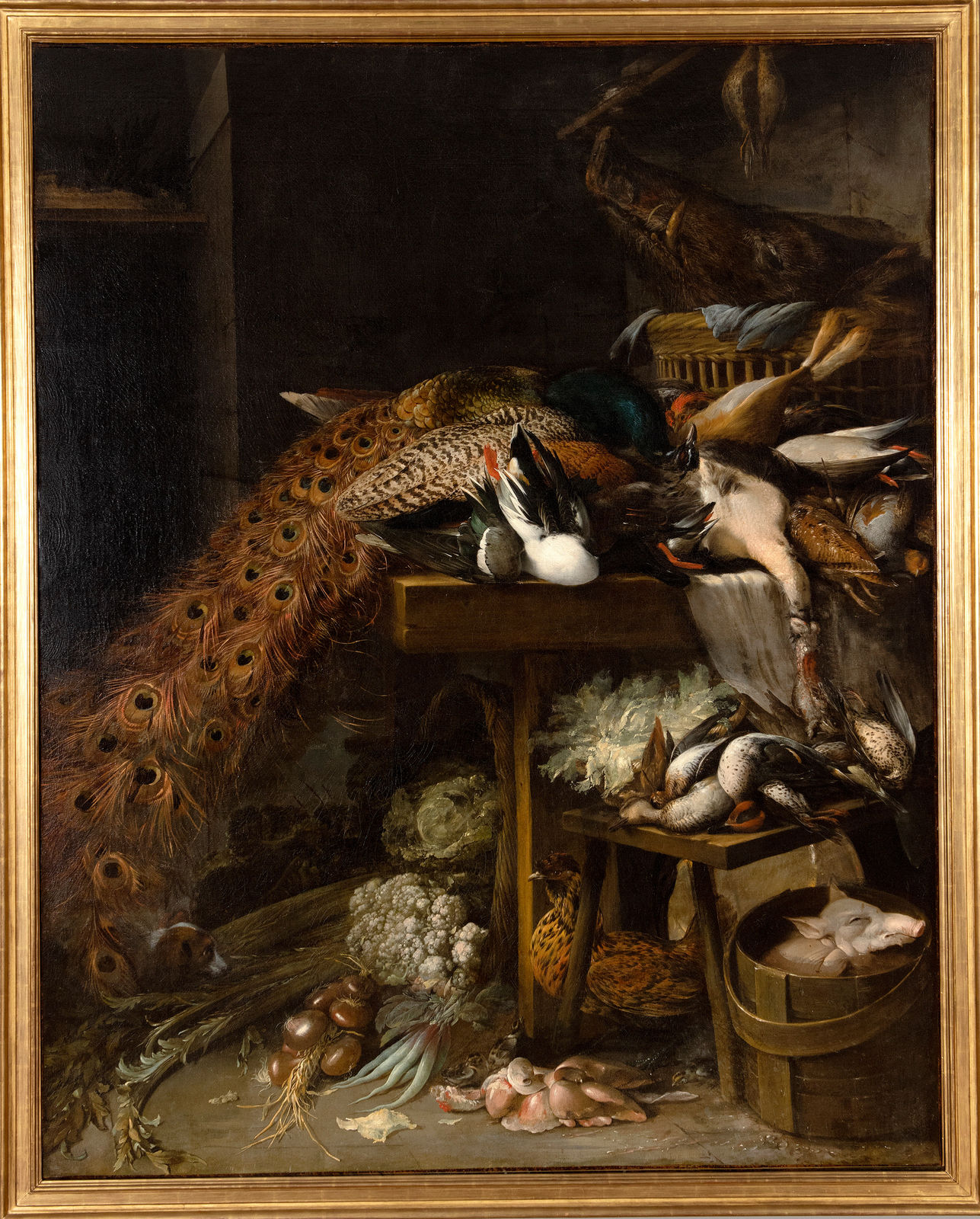 PETER VAN BOUCLE, Still life of game, vegetables, a pig, and a boar’s head in a basket