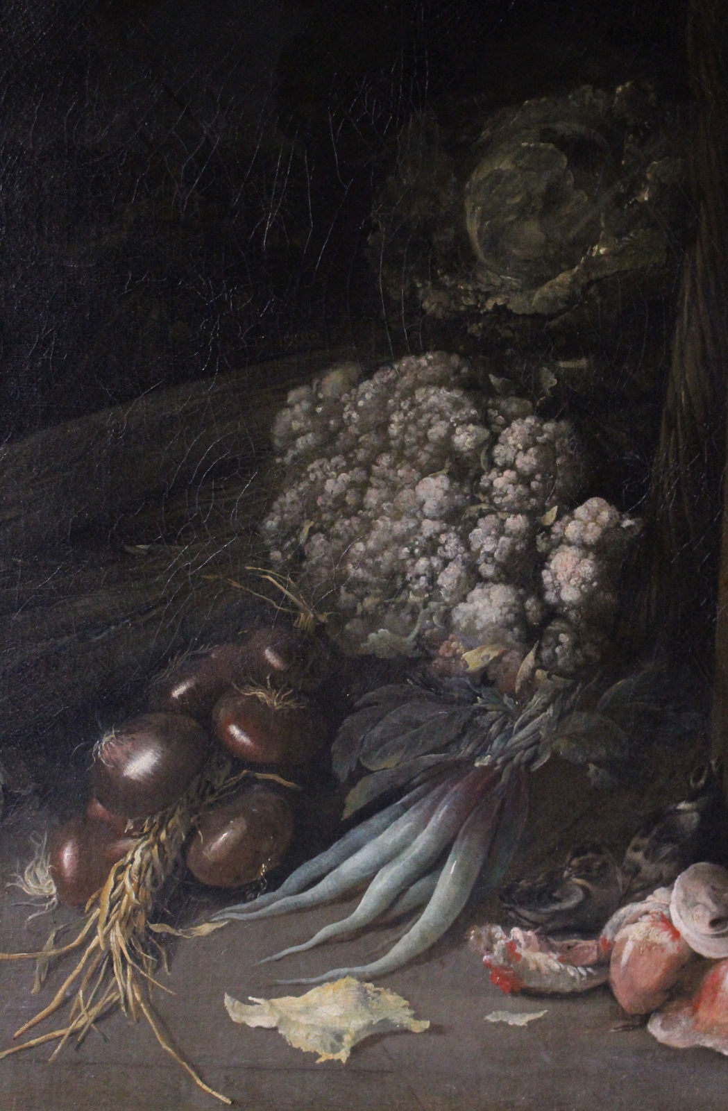 PETER VAN BOUCLE, Still life of game, vegetables, a pig, and a boar’s head in a basket