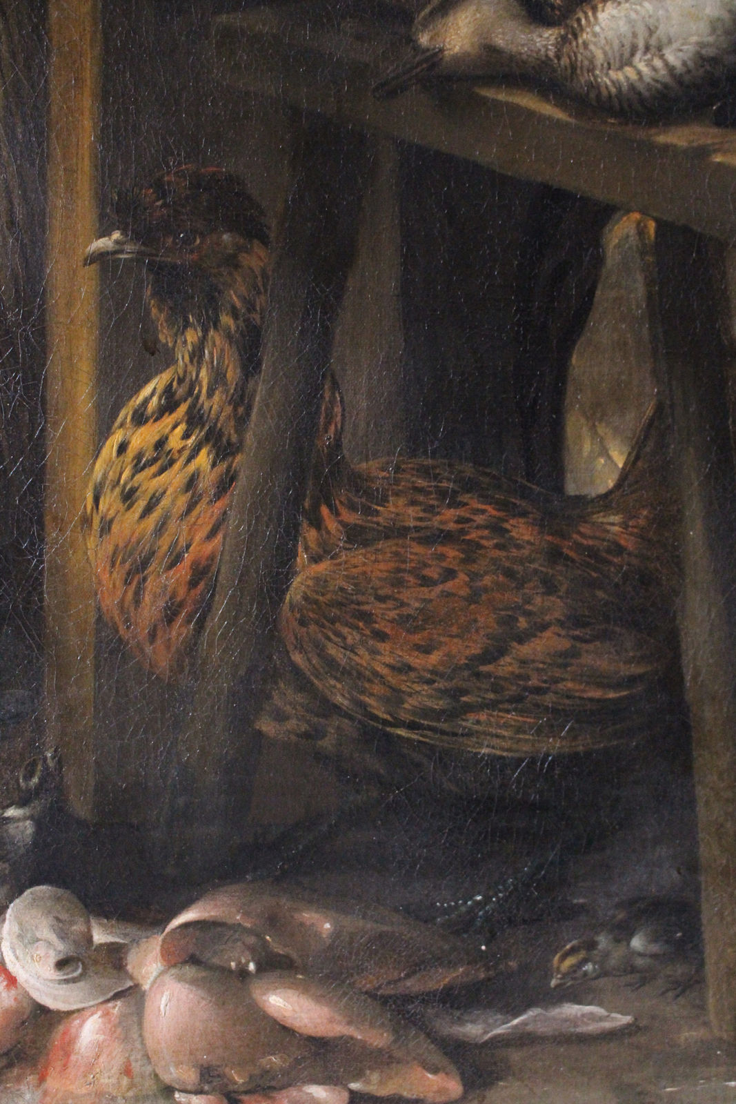 PETER VAN BOUCLE, Still life of game, vegetables, a pig, and a boar’s head in a basket