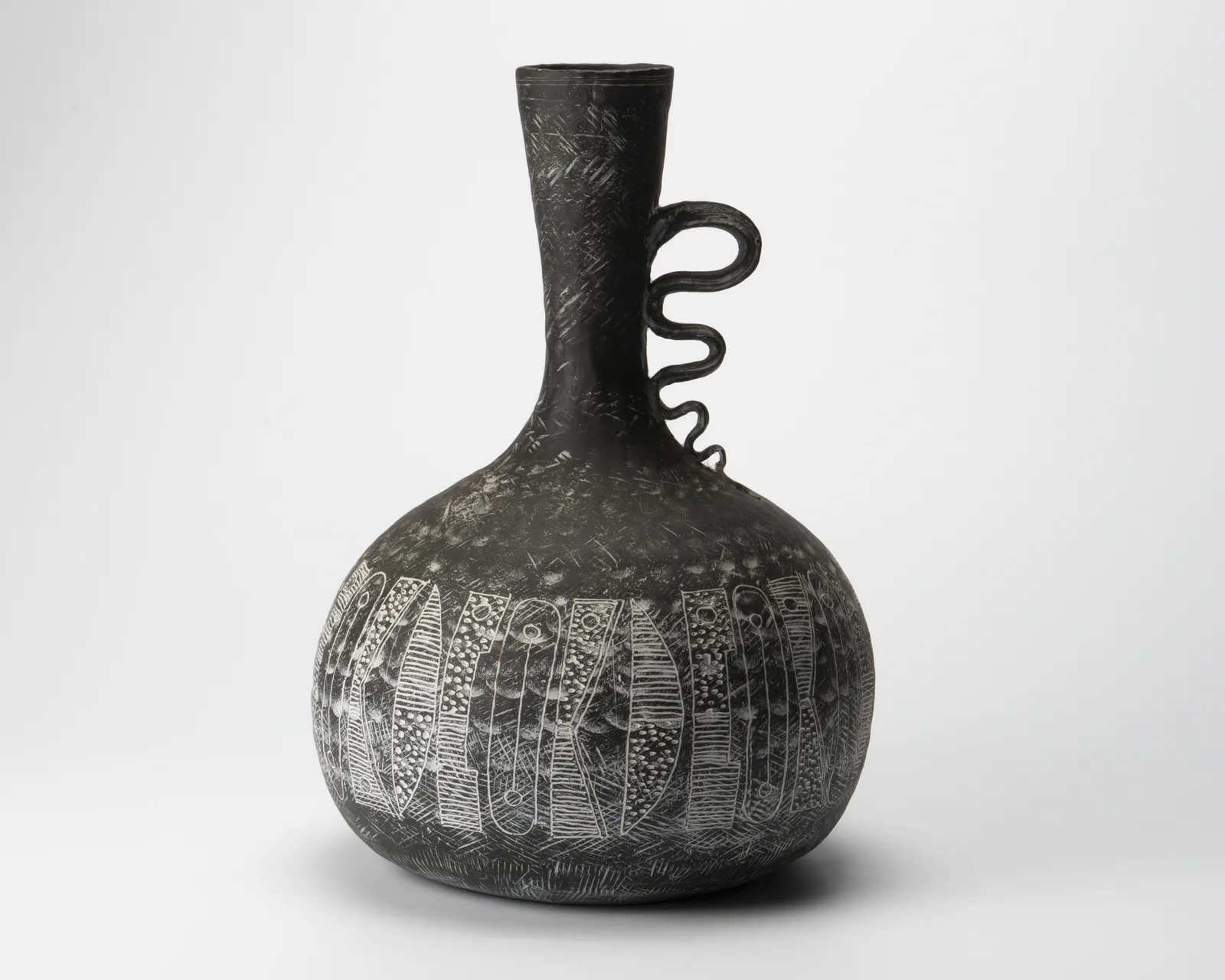 Yasuhara Kimei 安原喜明, Flower Vase with Matte Black Glaze and Linear Engraving, 炻器線彫文黒釉花生, circa late 1960s–1970s