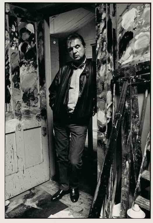 Bruce Bernard, Francis Bacon standing in the doorway of his studio, 1984