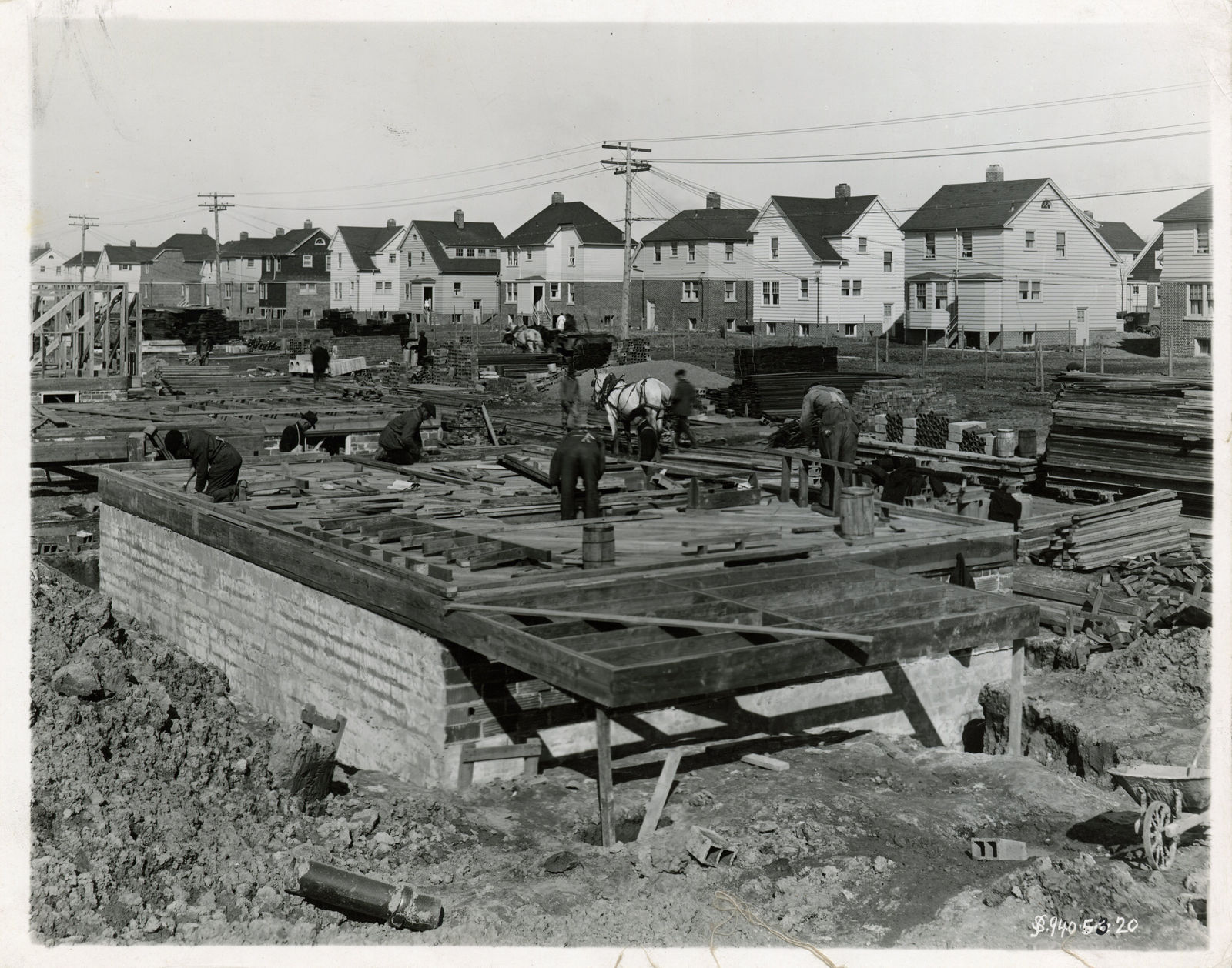 [Ford Homes], Group of Photos Showing Construction Dearborn-Area Planned Neighborhood, 1919-20