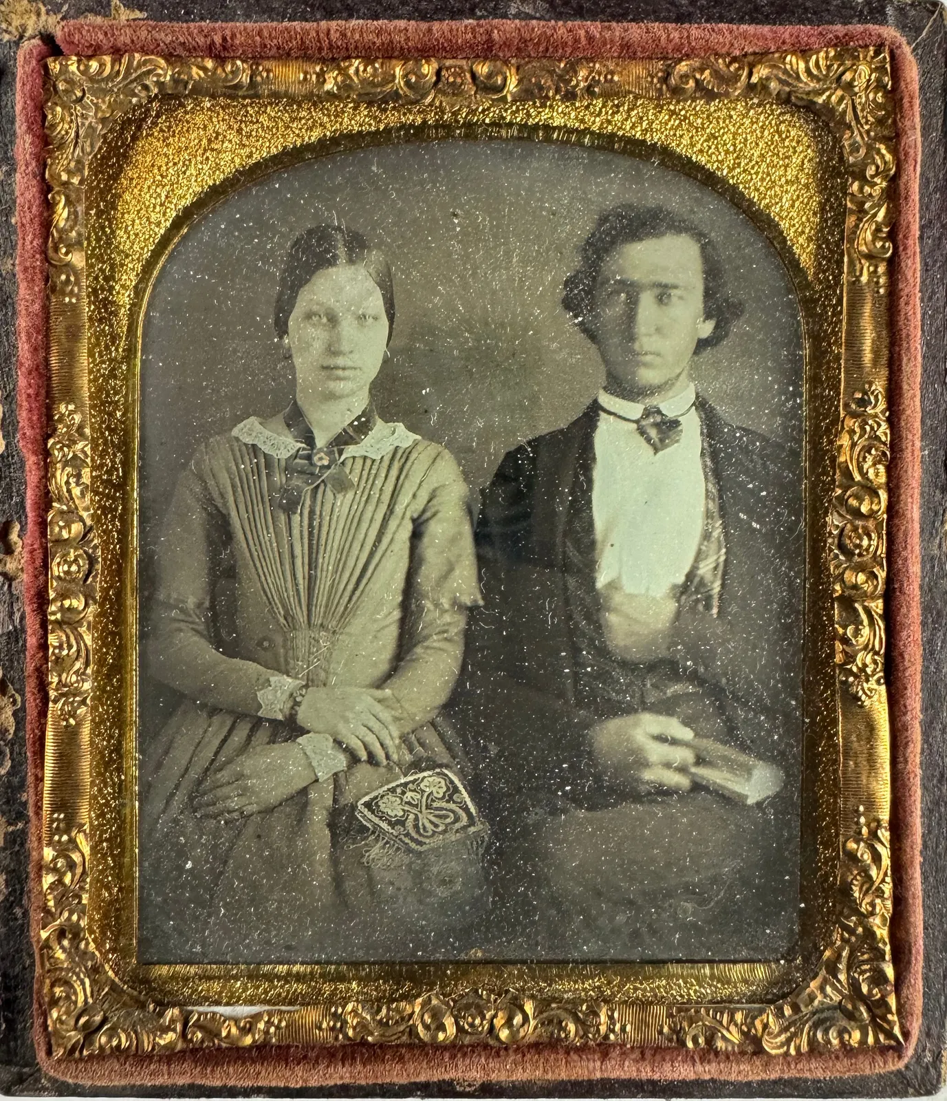 [Beadwork], Cased image portraits featuring beaded purses, c. 1850s-70s