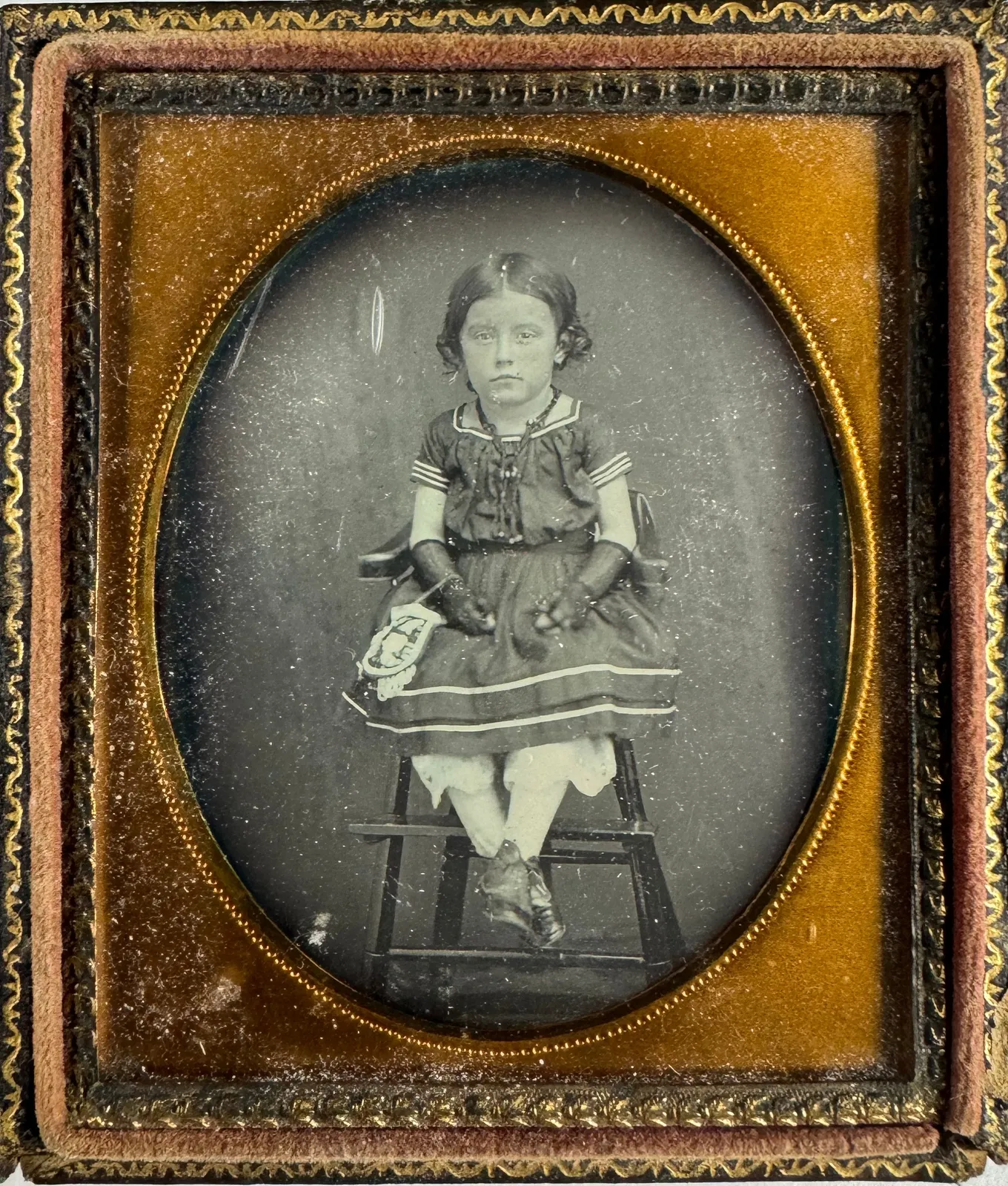 [Beadwork], Cased image portraits featuring beaded purses, c. 1850s-70s