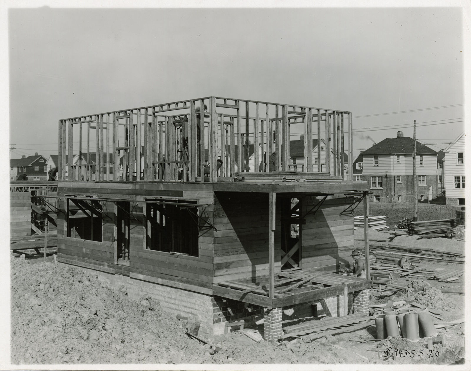 [Ford Homes], Group of Photos Showing Construction Dearborn-Area Planned Neighborhood, 1919-20