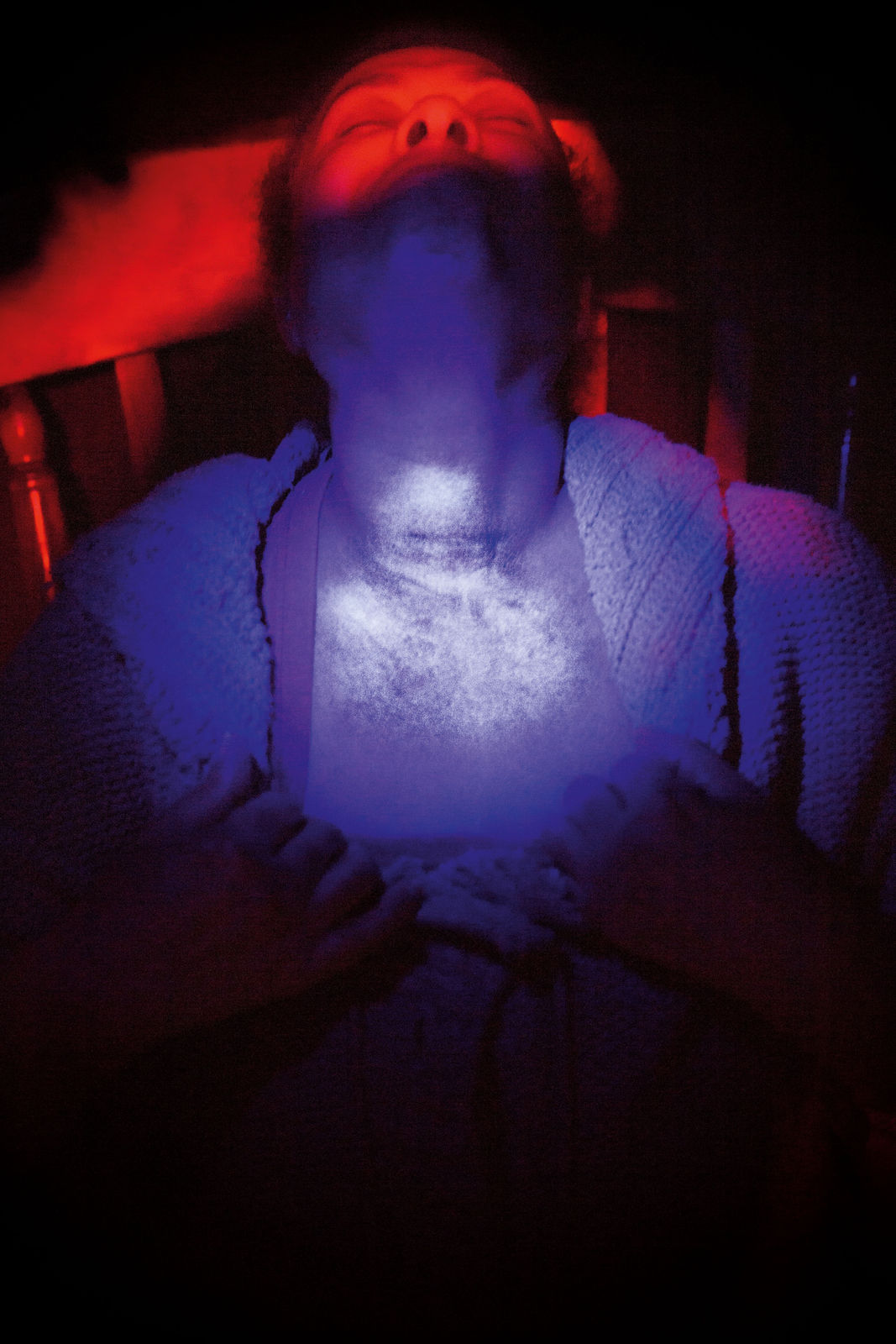 Shannon Taggart, Medium Sylvia Howarth prepares to show dermatographia messages on her skin. UK, 2018