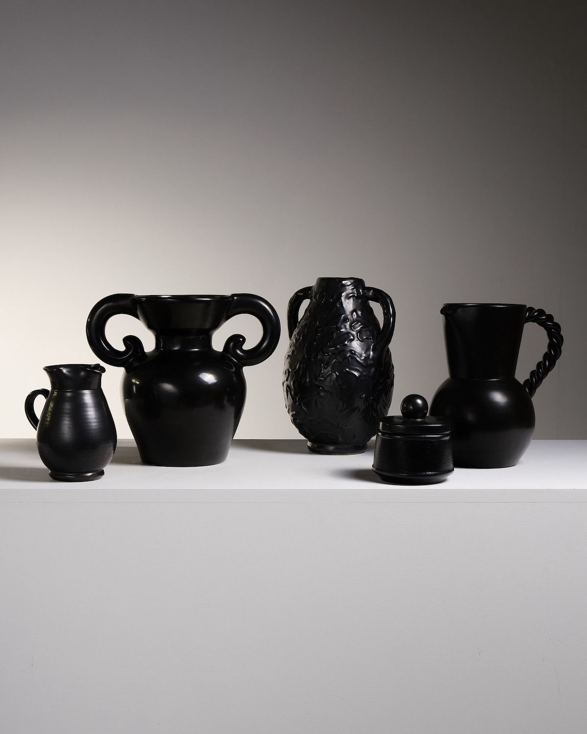 French, Group of five black pottery vessels