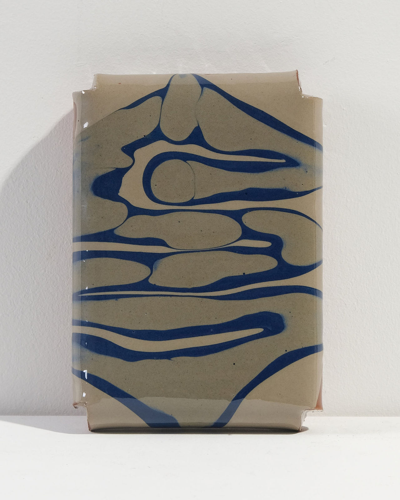 Nicola Tassie, Slip Pillow - Grey on dark blue on light grey