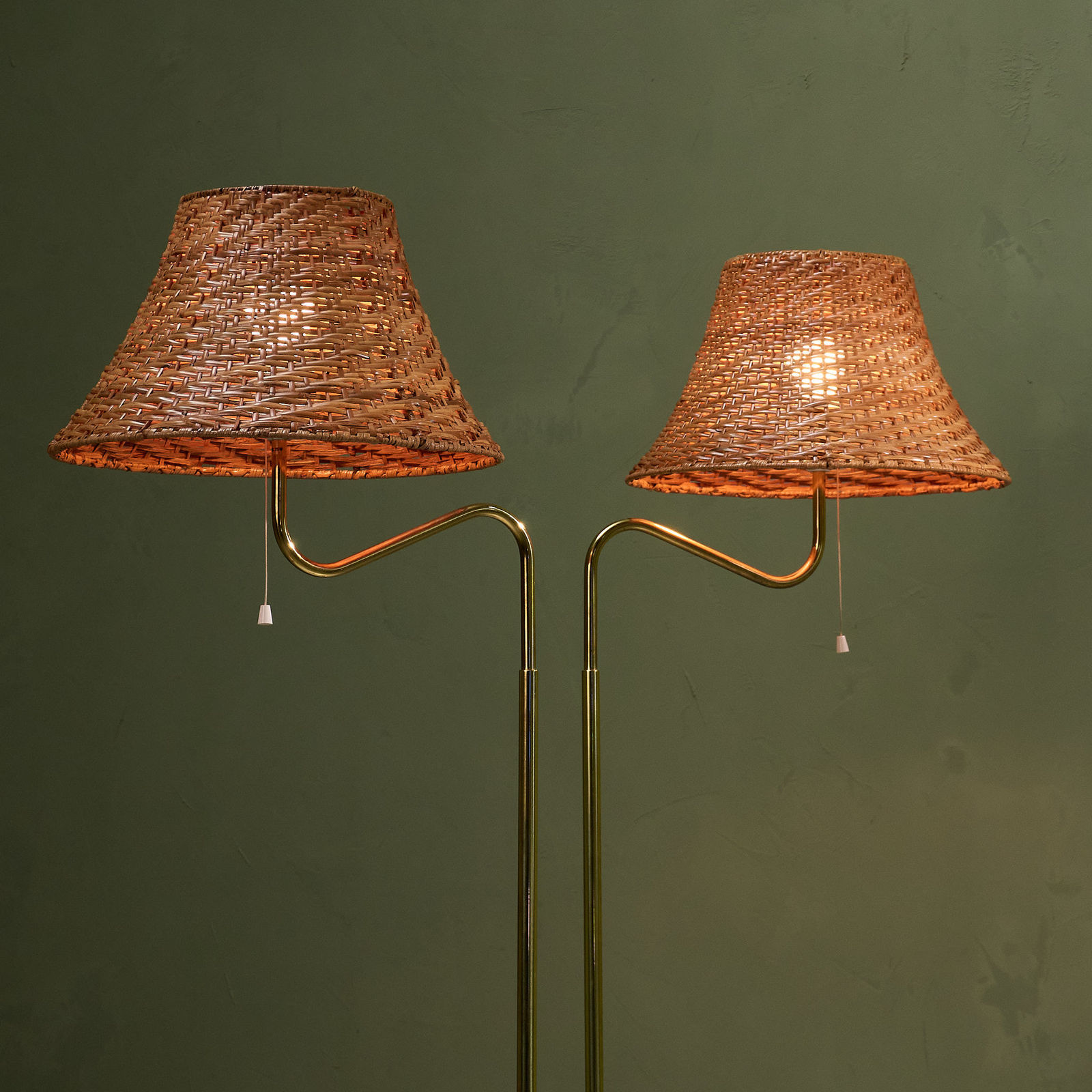 Bergboms, Pair of Floor Lamps with Rattan Shade and Curved Brass Stem, Sweden, 1960s