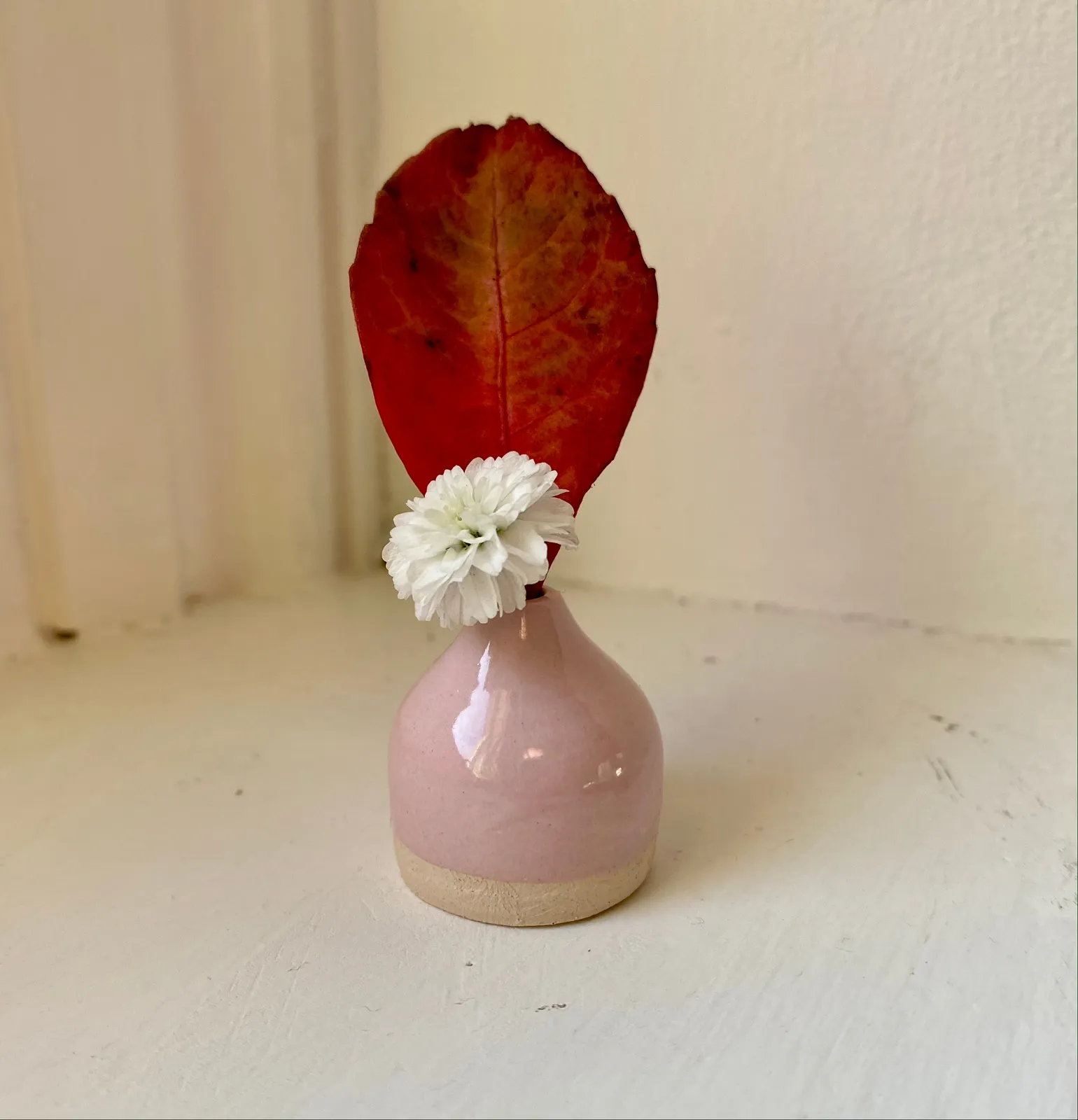 miniature light pink vase with flowers