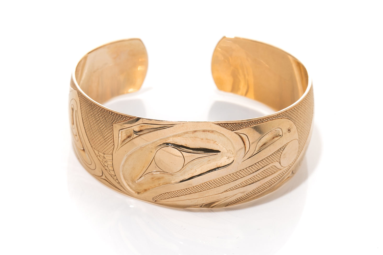 JIM EDENSHAW (1955-2013) HAIDA, Cuff Bracelet with Raven and Sun Design, 1990s