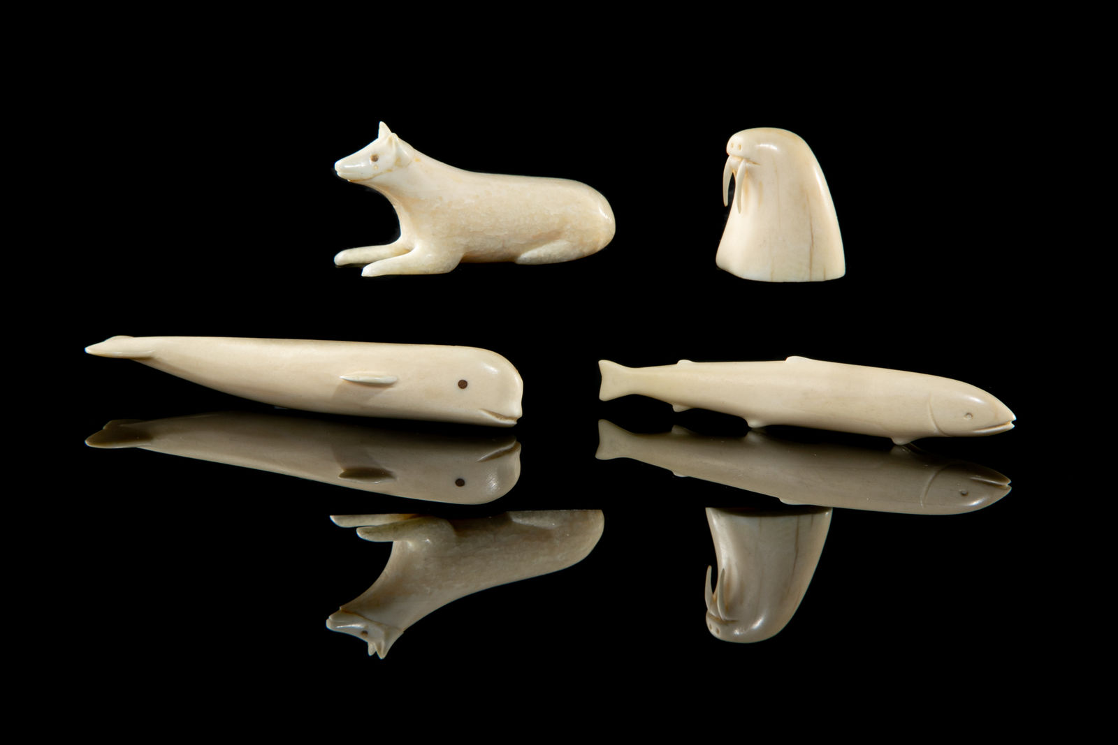 UNIDENTIFIED ARTISTS, possibly PANNIRTUQ (PANGNIRTUNG), Four Ivory Miniature Animals, early-mid 1960s