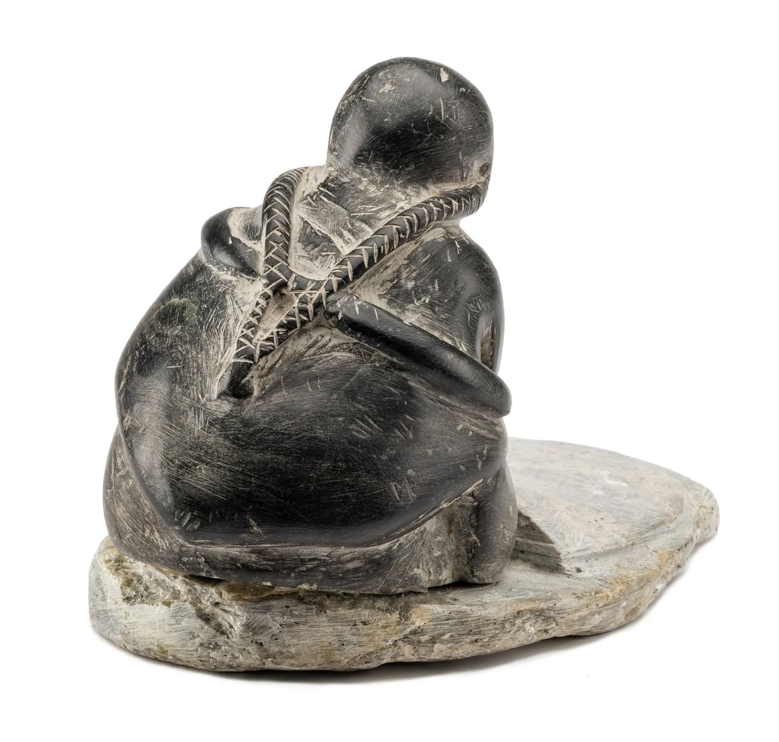 ENNUTSIAK (1893-1967) IQALUIT (FROBISHER BAY), Woman Preparing a Skin, c. late 1950s