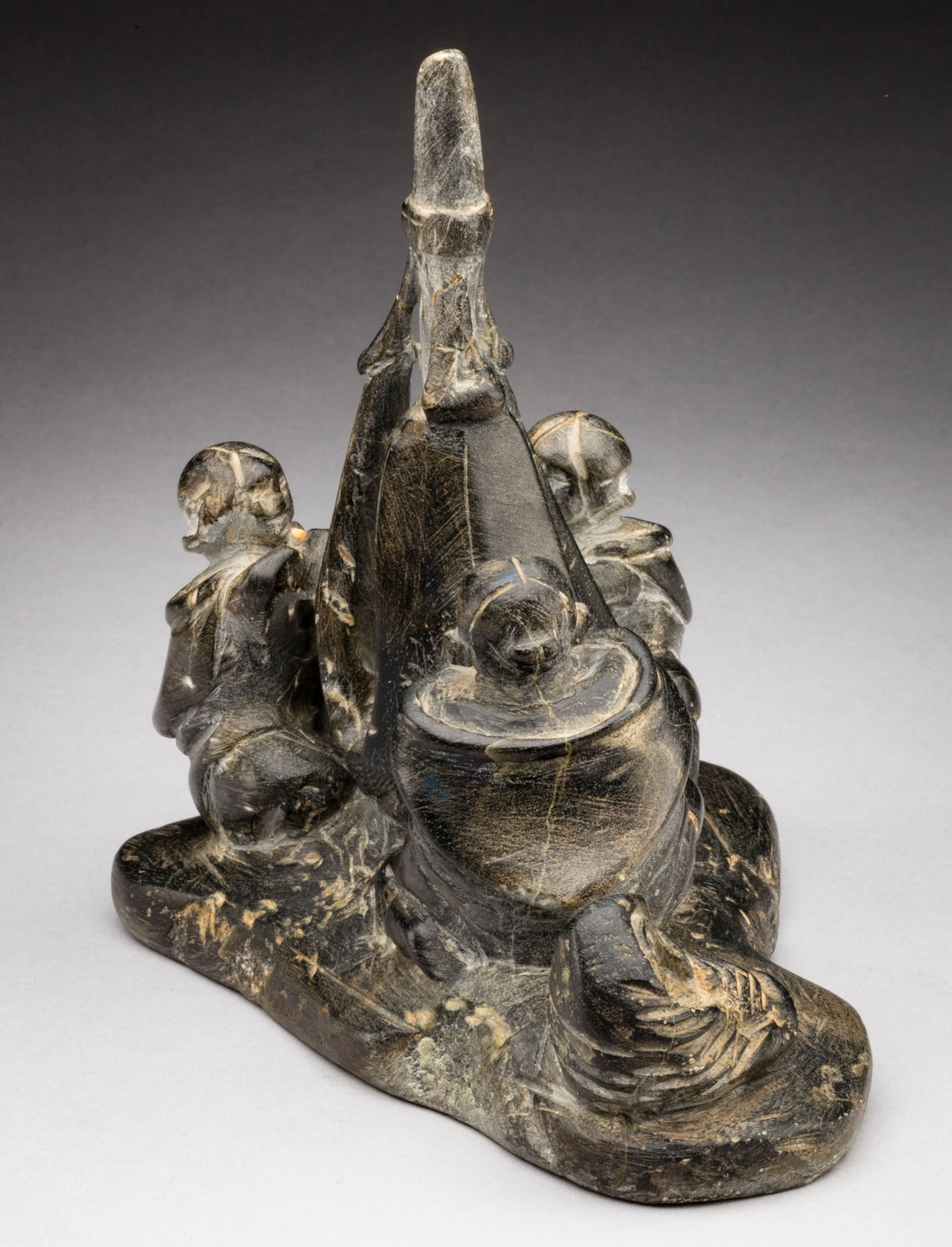 ENNUTSIAK (1893-1967) IQALUIT (FROBISHER BAY), Women Sewing Skins for a Kayak, c. 1958-60