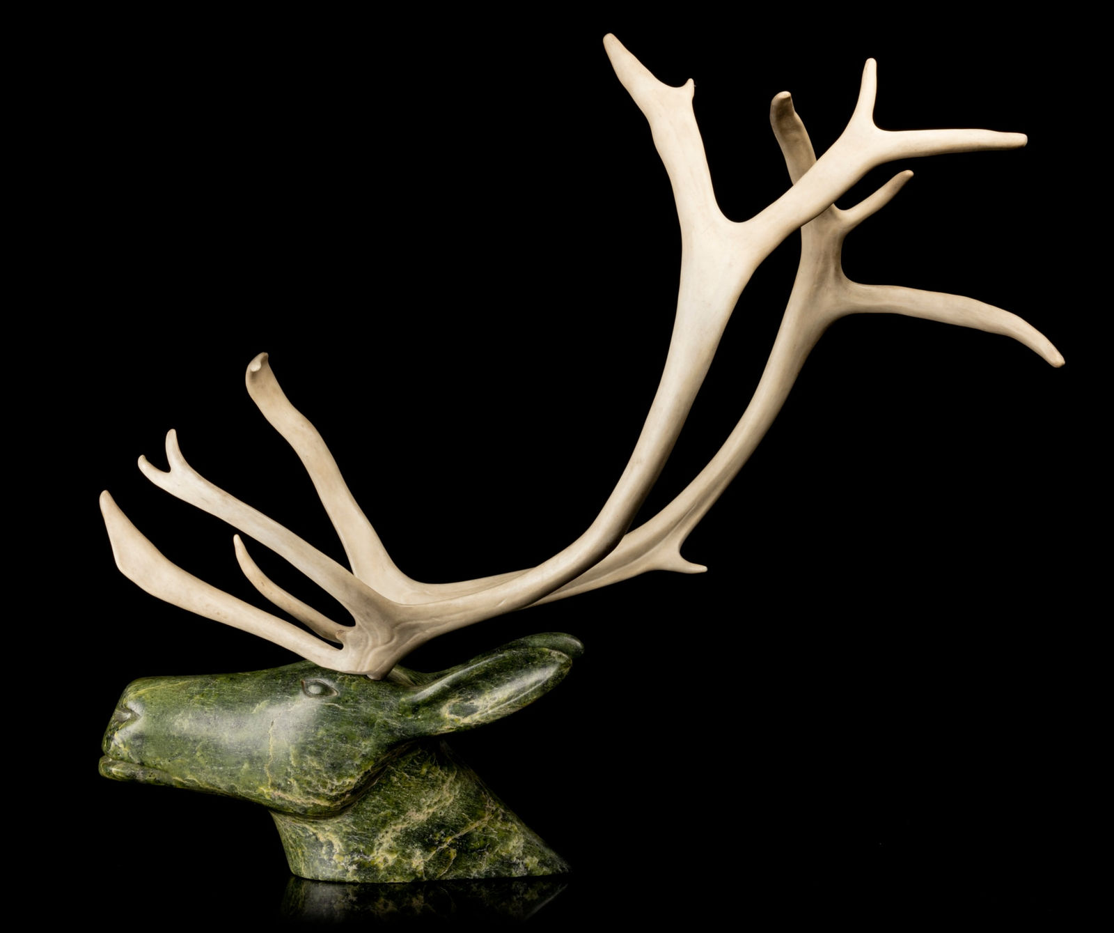 OSUITOK IPEELEE, R.C.A. (1922-2005) KINNGAIT (CAPE DORSET), Caribou Head Emerging from Water, c. early 1980s