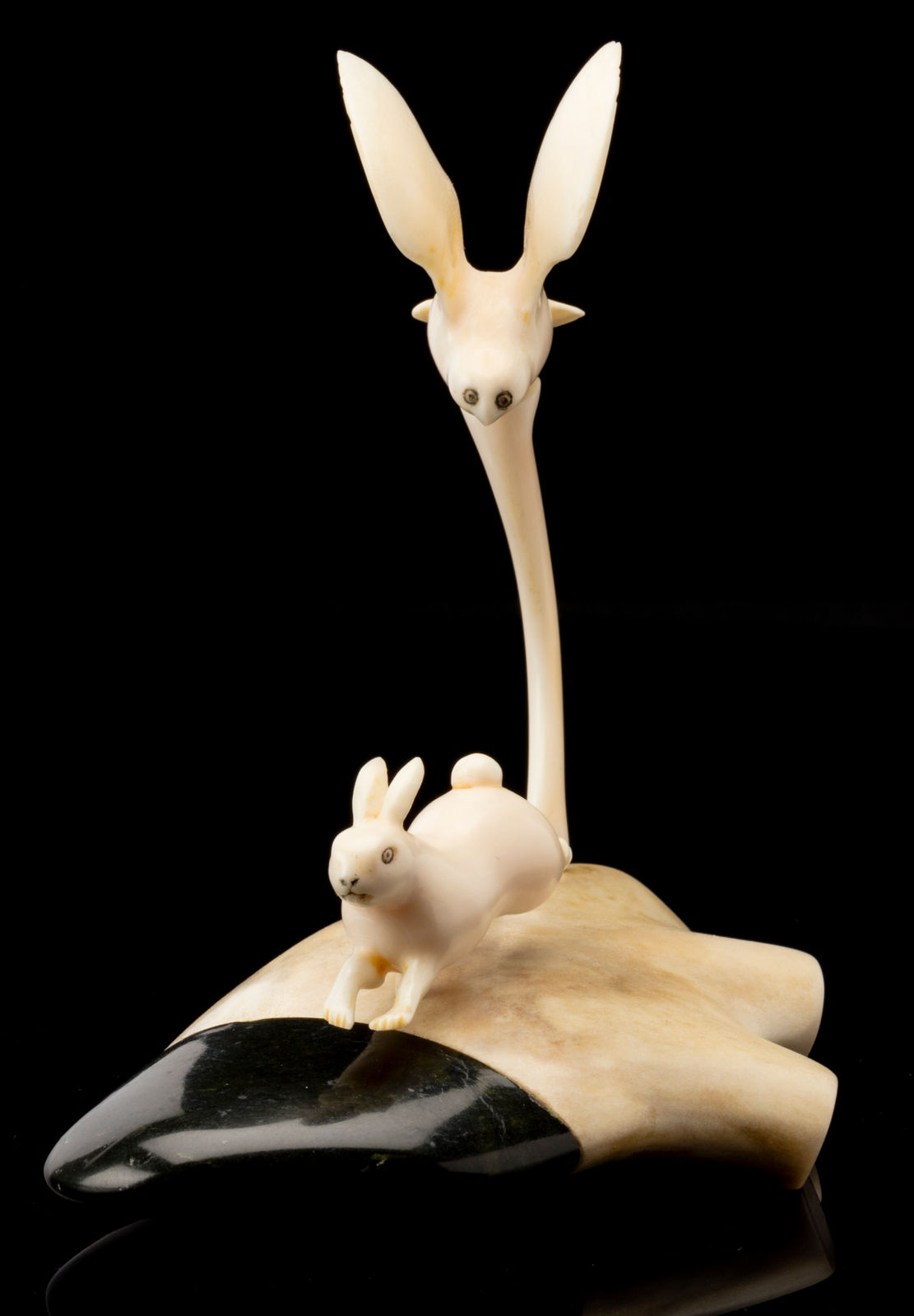 HENRY EVALUARDJUK (1923-2007) IQALUIT (FROBISHER BAY), Owl in Pursuit of an Arctic Hare, 1973