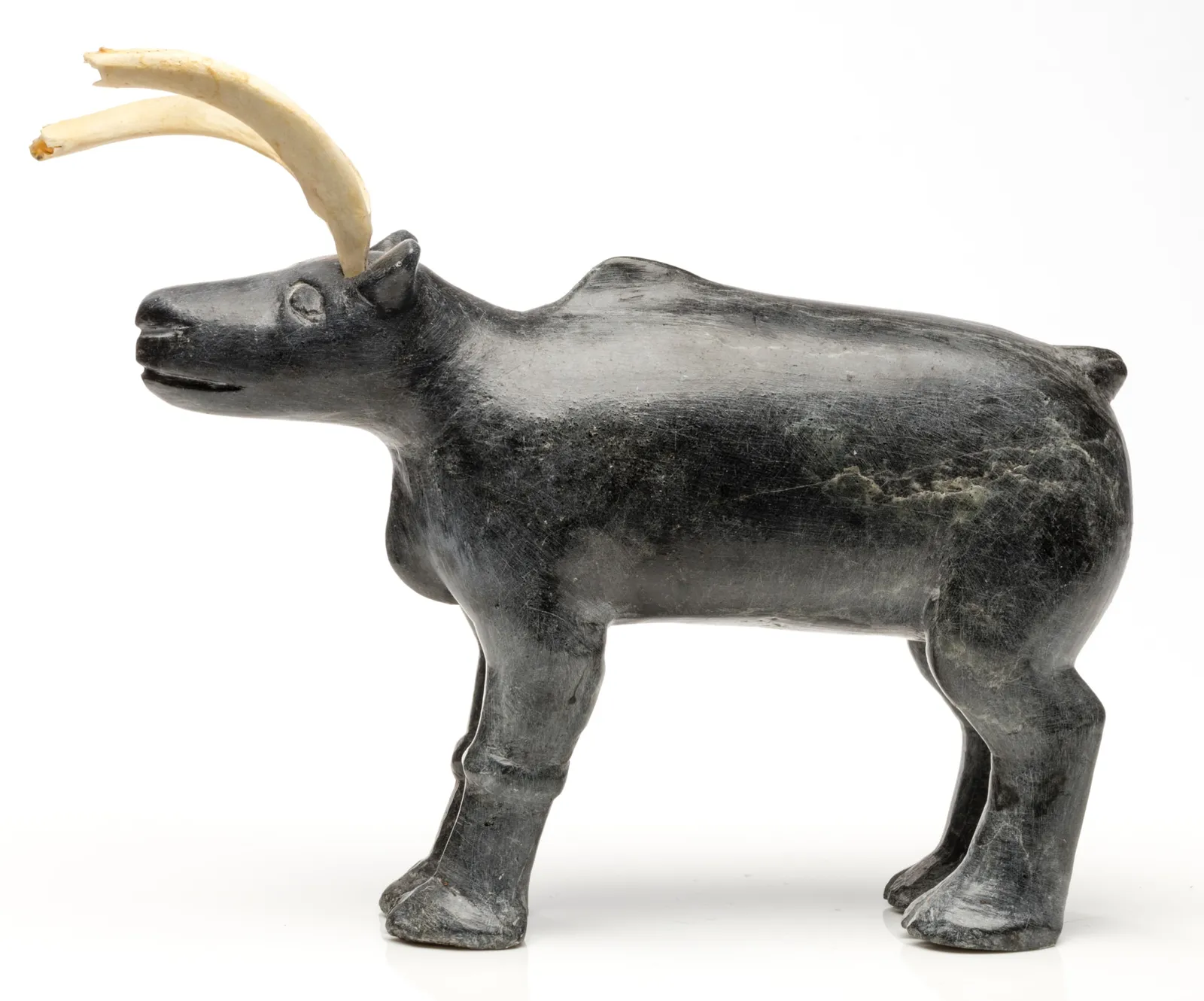 JOE TALIRUNILI (1893-1976) PUVIRNITUQ (POVUNGNITUK), Standing Caribou, c. 1965