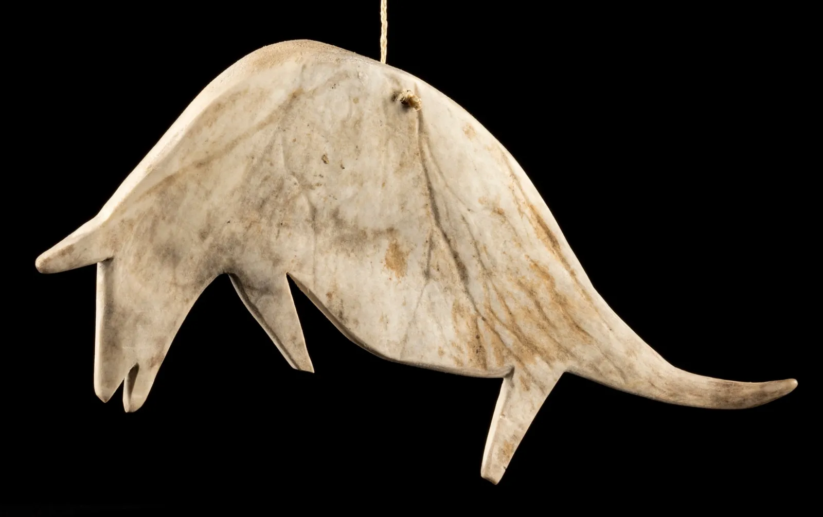 ANDY MIKI (1918-1983) ARVIAT/TIKIRAQJUAQ (ESKIMO POINT/WHALE COVE), Animal Plaque, c. 1969