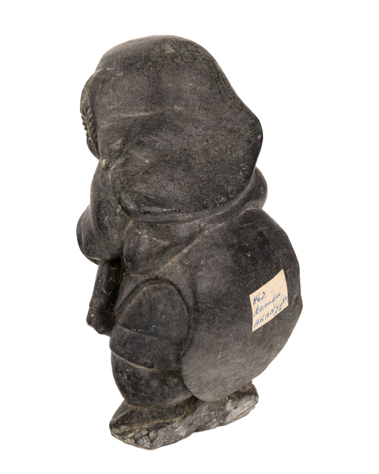 DAVIDEE SAUMIK (1925-1984) INUKJUAK (PORT HARRISON), Woman Softening a Kamik, 1962