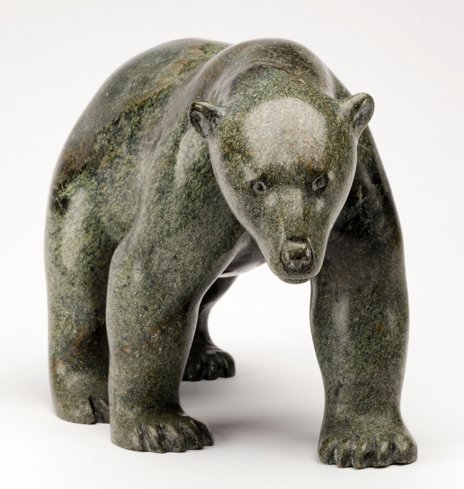 HENRY EVALUARDJUK (1923-2007) IQALUIT (FROBISHER BAY), Walking Polar Bear, c. 1980