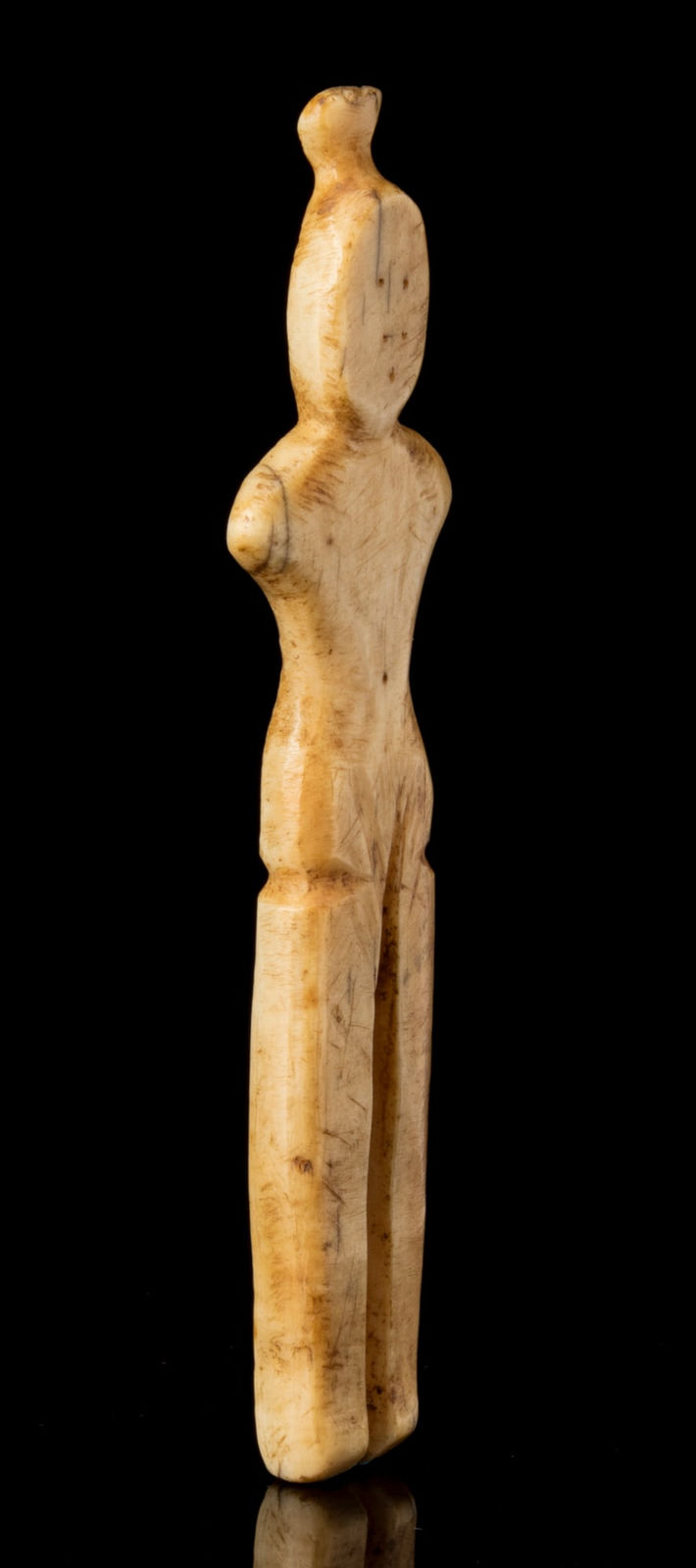 THULE CULTURE OR EARLY HISTORIC PERIOD INUIT ARTIST, POSSIBLY POND INLET AREA, Female Figurine, 19th century or earlier