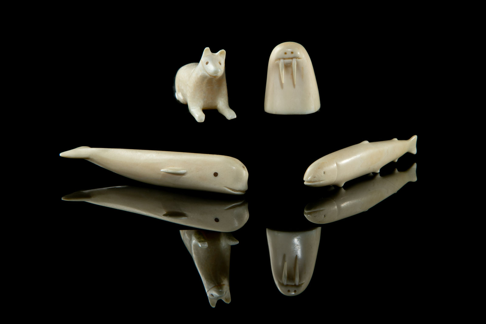 UNIDENTIFIED ARTISTS, possibly PANNIRTUQ (PANGNIRTUNG), Four Ivory Miniature Animals, early-mid 1960s