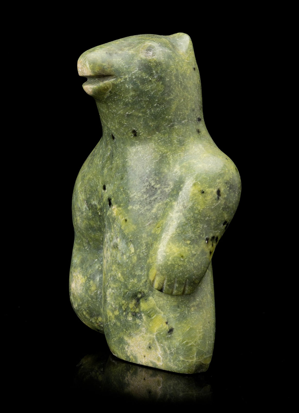 KENOJUAK ASHEVAK, C.C., R.C.A. (1927-2013) KINNGAIT (CAPE DORSET), Smiling Polar Bear, early 1960s