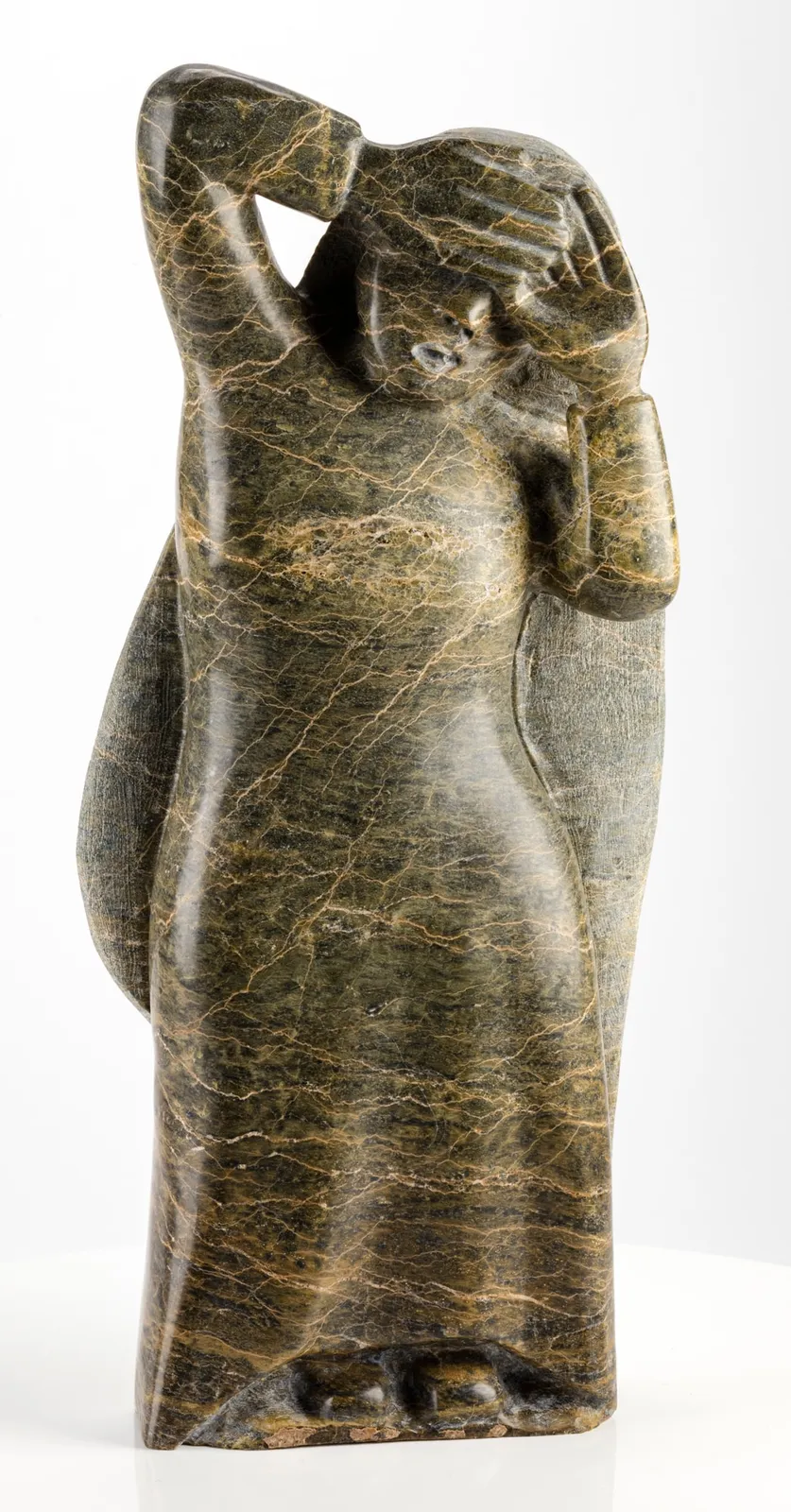 OVILOO TUNNILLIE, R.C.A. (1949-2014) KINNGAIT (CAPE DORSET), Woman Covering Her Face, c. 2000