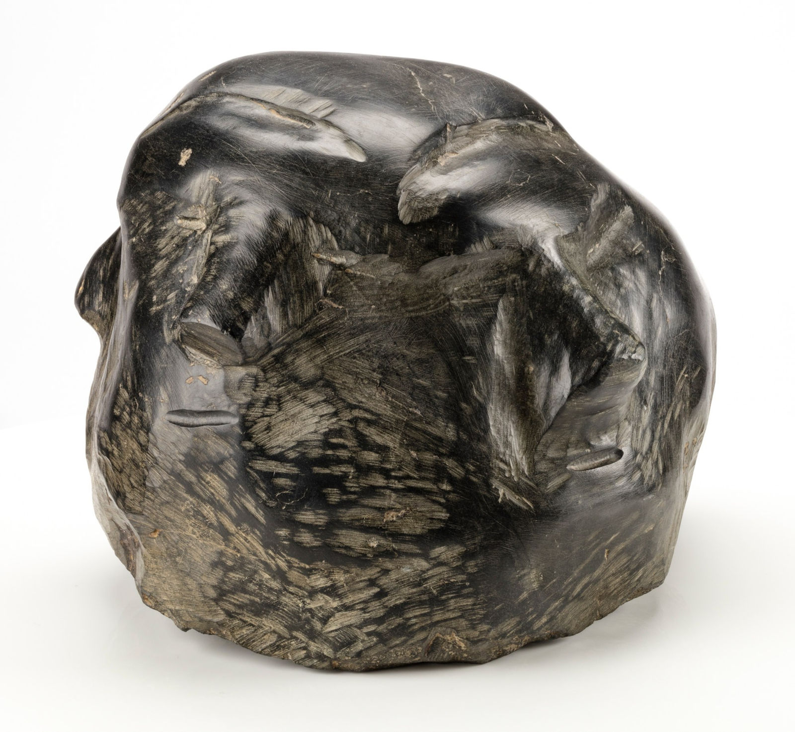 TUNA IQUILIQ (1934-2015) QAMANI'TUAQ (BAKER LAKE), Four Faces, c. mid to late 1970s