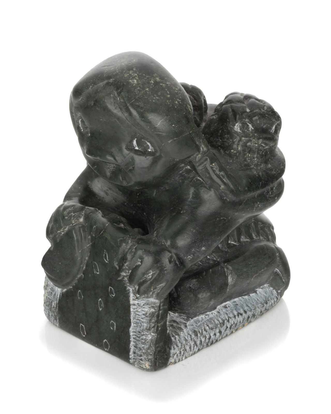 JOHNNY INUKPUK, R.C.A. (1911-2007) INUKJUAK (PORT HARRISON), Mother with Child, Preparing a Seal Skin, 1970s
