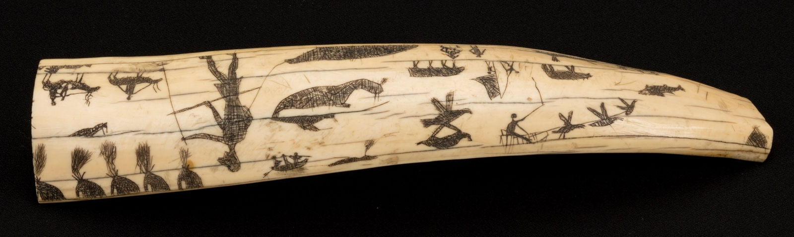UNIDENTIFIED ARTIST, PROBABLY IÑUPIAQ, POSSIBLY SAINT MICHAEL AREA, ALASKA, Engraved Walrus Tusk, c. 1890s