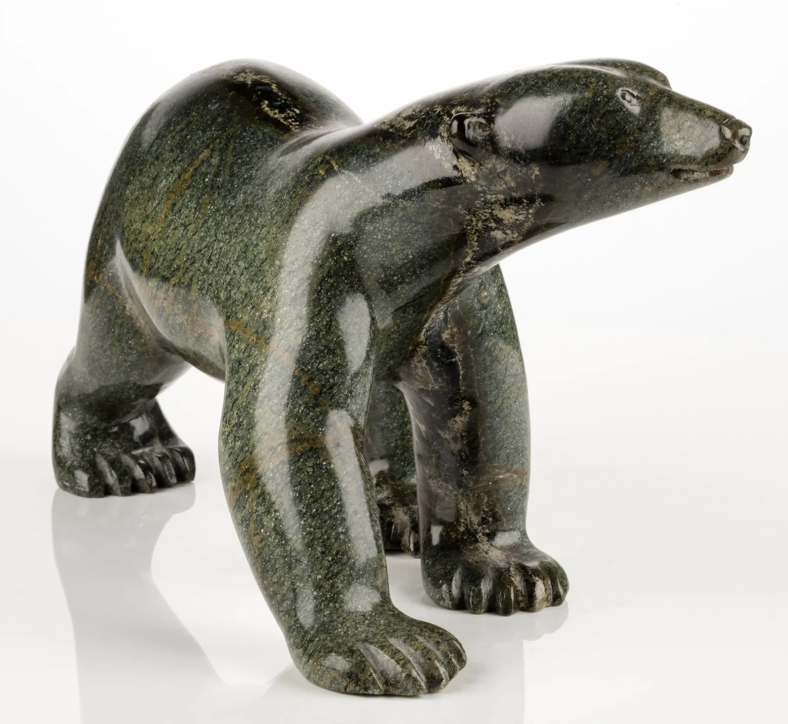 HENRY EVALUARDJUK (1923-2007) IQALUIT (FROBISHER BAY), Walking Bear, c. 1980