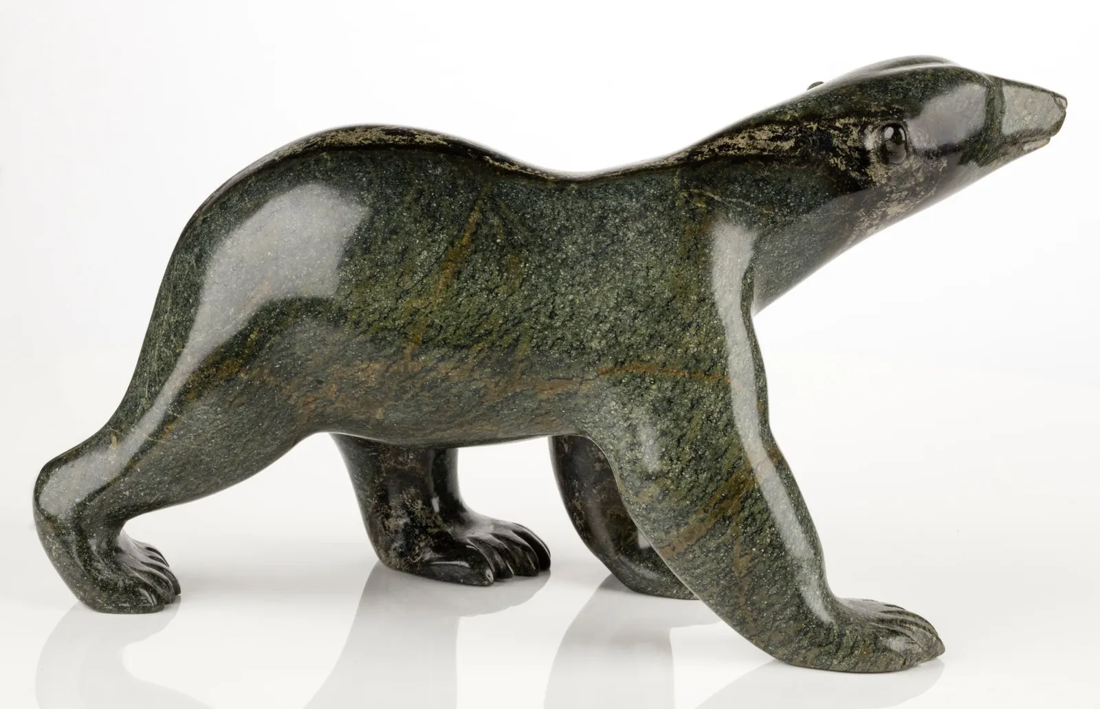 HENRY EVALUARDJUK (1923-2007) IQALUIT (FROBISHER BAY), Walking Bear, c. 1980