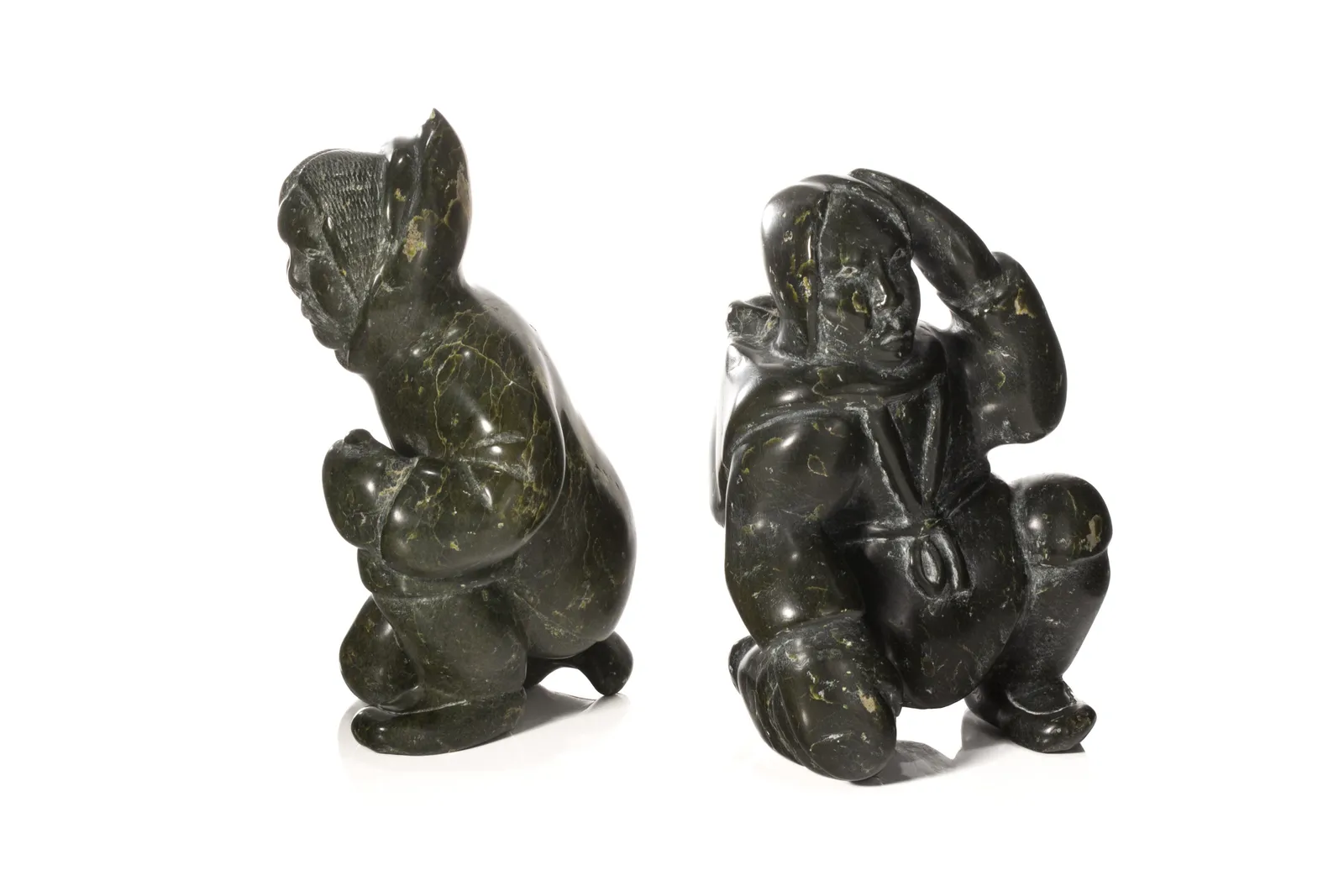 TOWATUGA SAGOUK (1934-1996) IQALUIT (FROBISHER BAY), Kneeling Man and Woman, with Child in her Amaut, c. 1970s