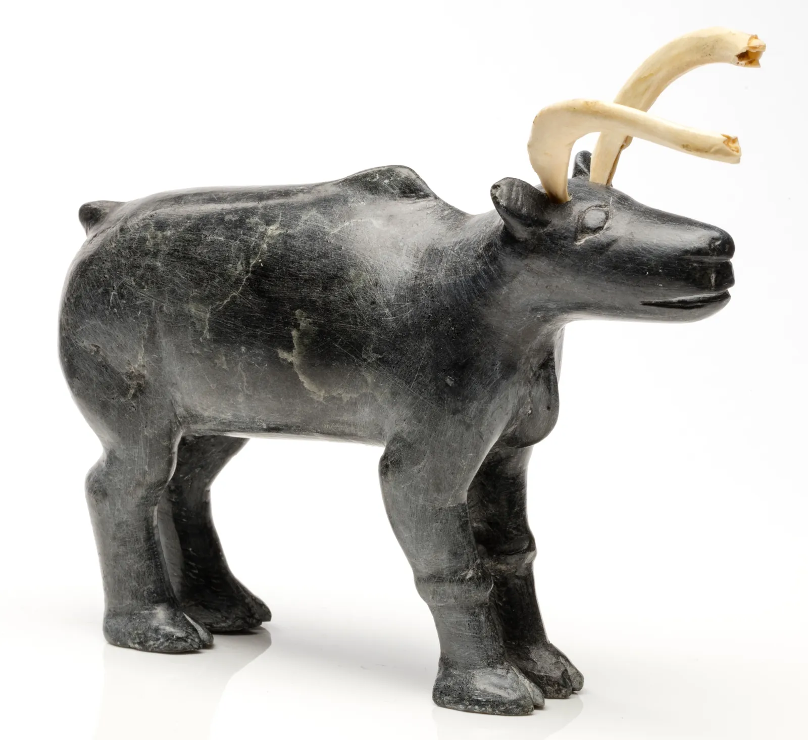 JOE TALIRUNILI (1893-1976) PUVIRNITUQ (POVUNGNITUK), Standing Caribou, c. 1965