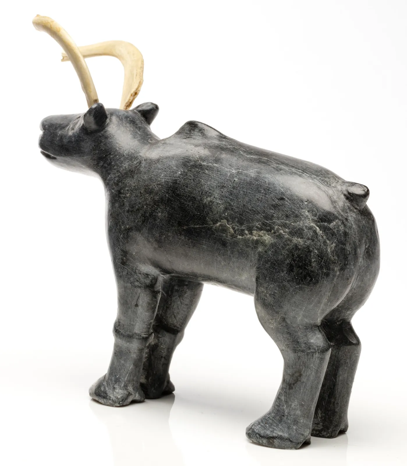 JOE TALIRUNILI (1893-1976) PUVIRNITUQ (POVUNGNITUK), Standing Caribou, c. 1965