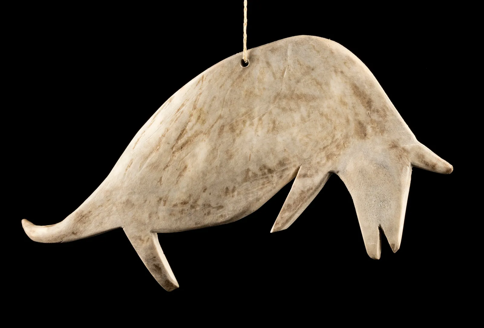 ANDY MIKI (1918-1983) ARVIAT/TIKIRAQJUAQ (ESKIMO POINT/WHALE COVE), Animal Plaque, c. 1969