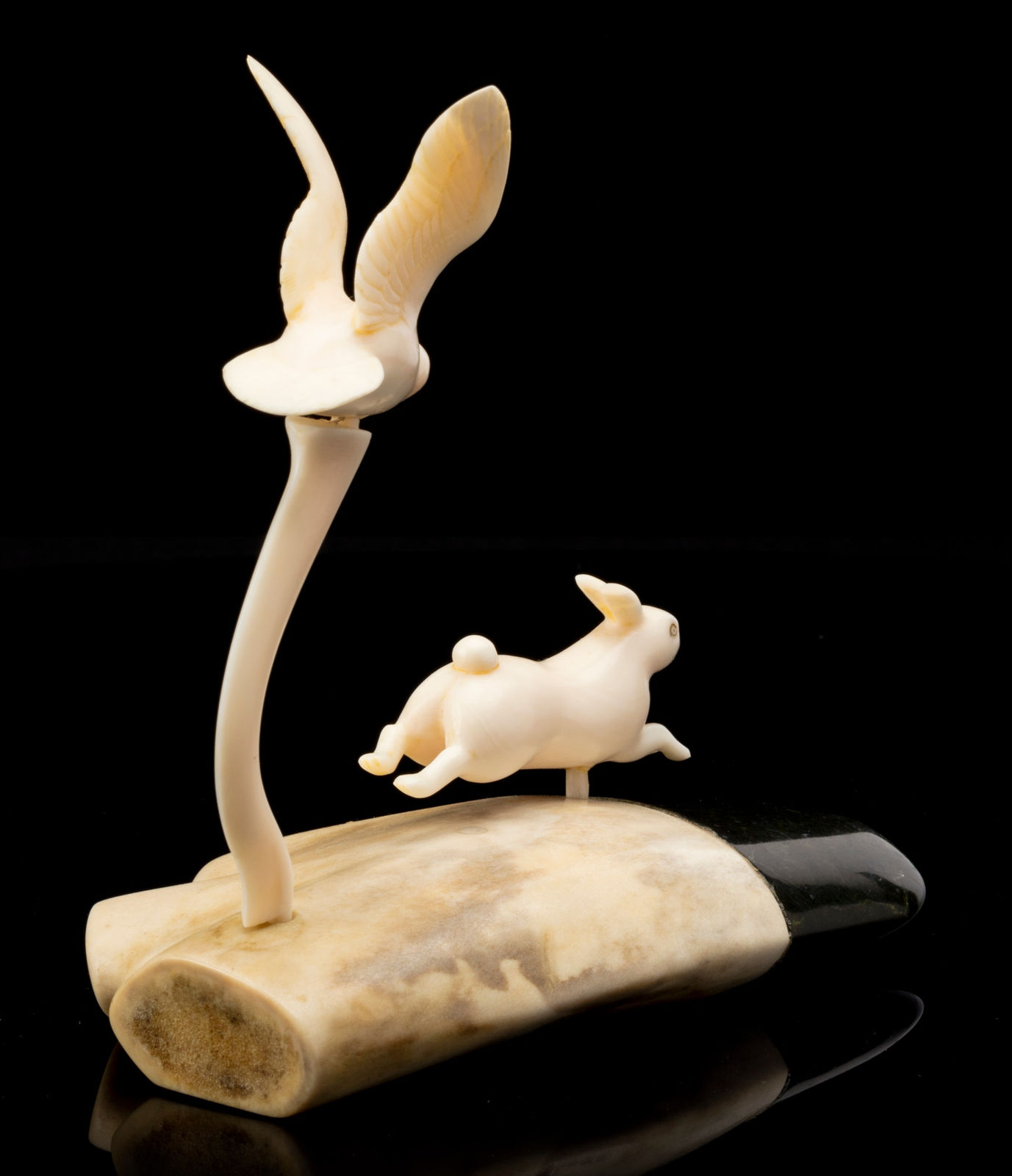 HENRY EVALUARDJUK (1923-2007) IQALUIT (FROBISHER BAY), Owl in Pursuit of an Arctic Hare, 1973