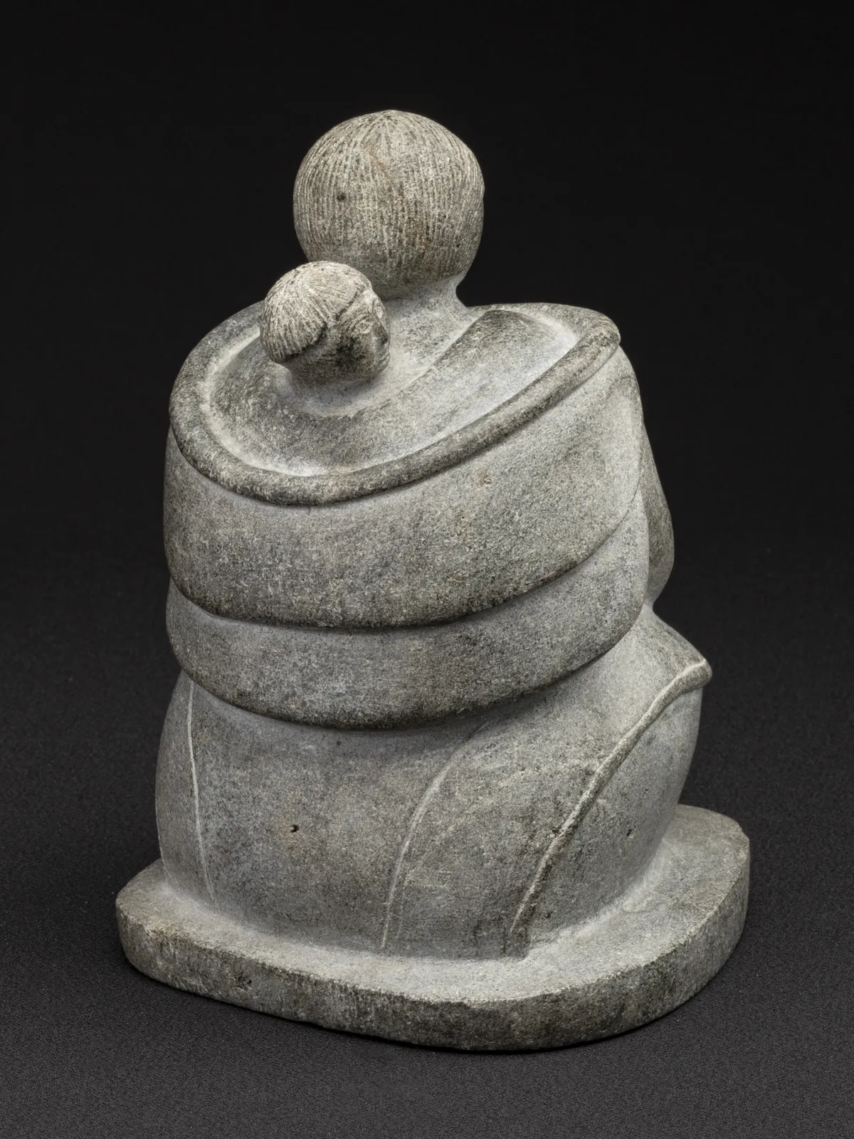 MANU KANARJUAQ QAUNNAALUK (1929-D?) IVUJIVIK, Seated Woman and Child, c. 1958