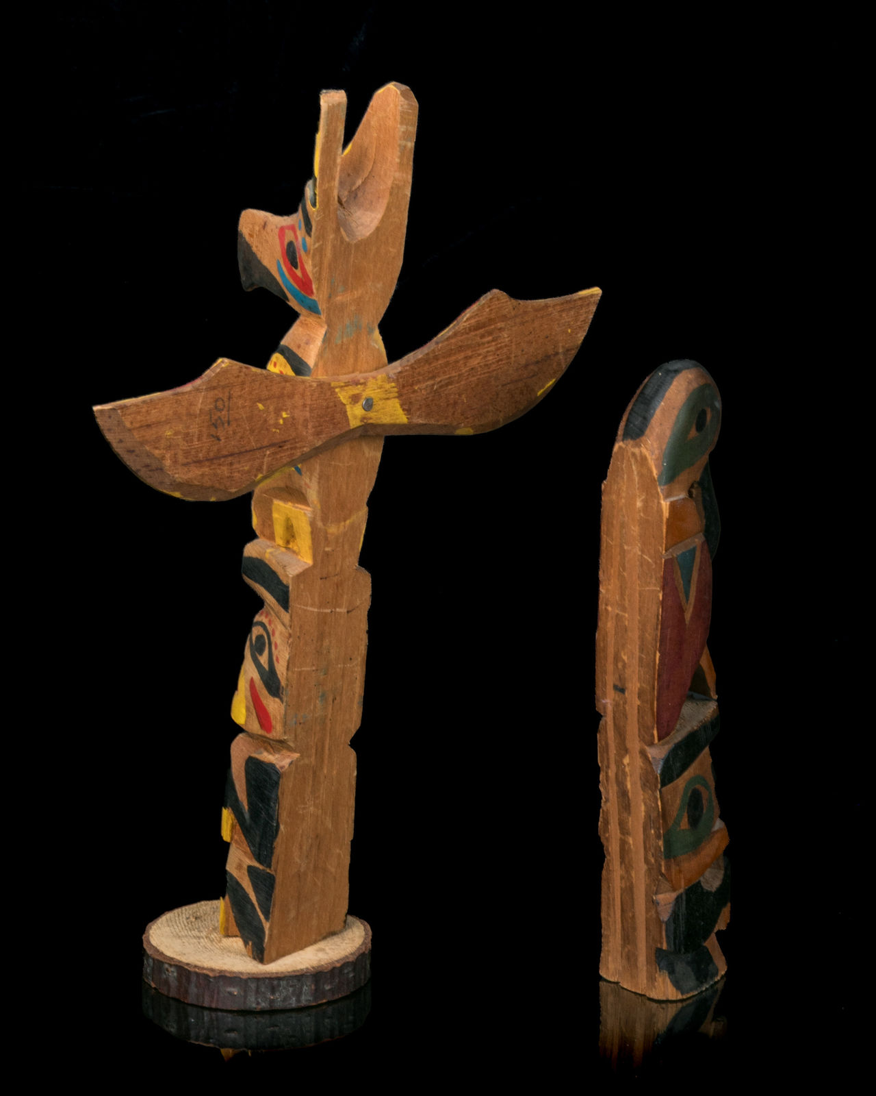 UNKNOWN NUU-CHAH-NULTH CARVERS, Two Model Totem Poles, c. 1930s / 1940s